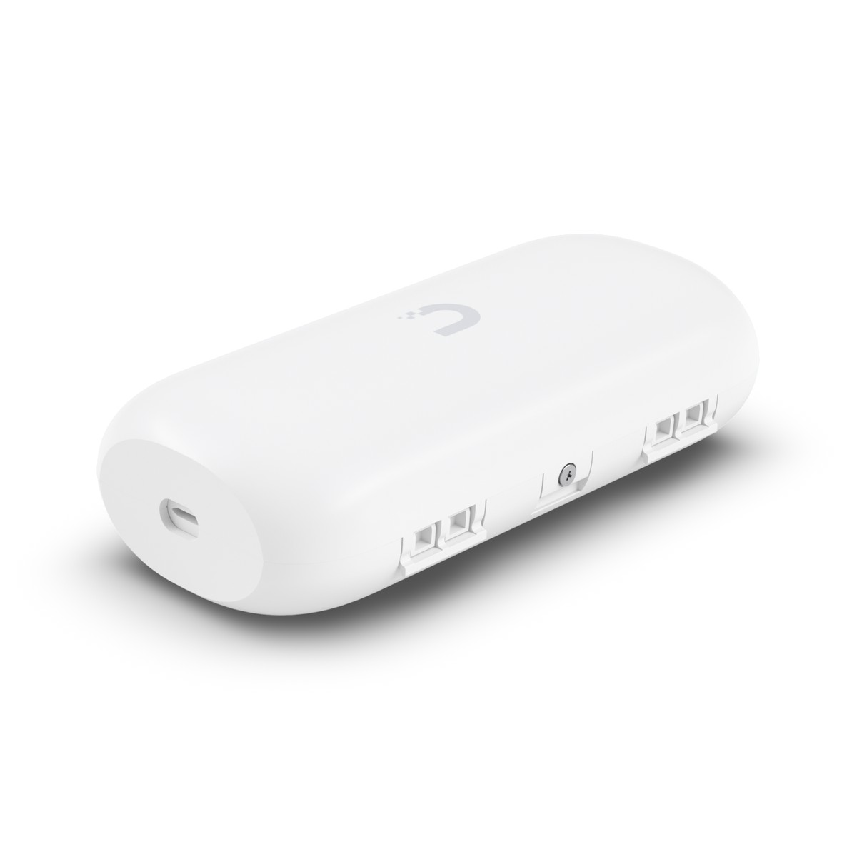 Un dispositivo elettronico bianco e arrotondato con porte su una superficie chiara.