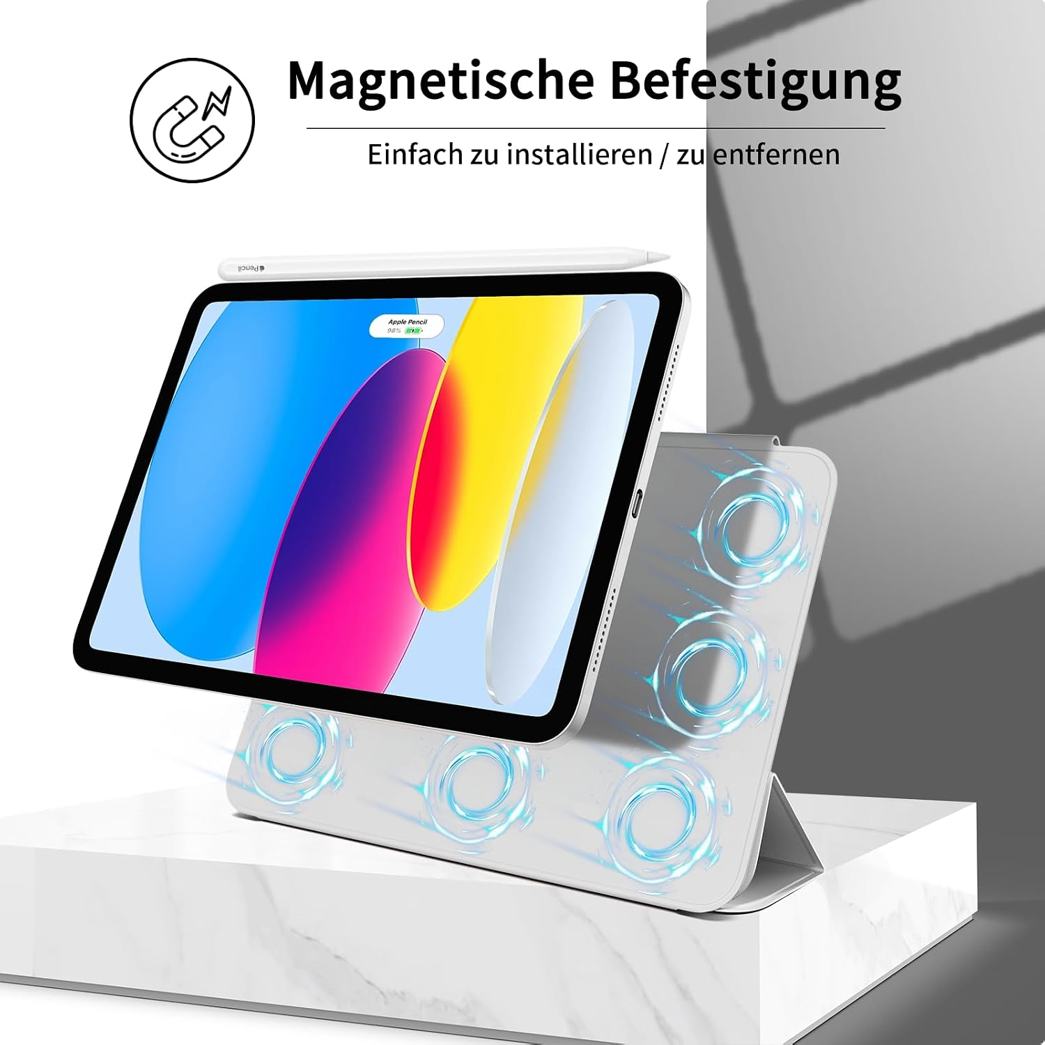 Ein Tablet ist magnetisch auf einem grauen Ständer befestigt, mit einem Stift oben auf.