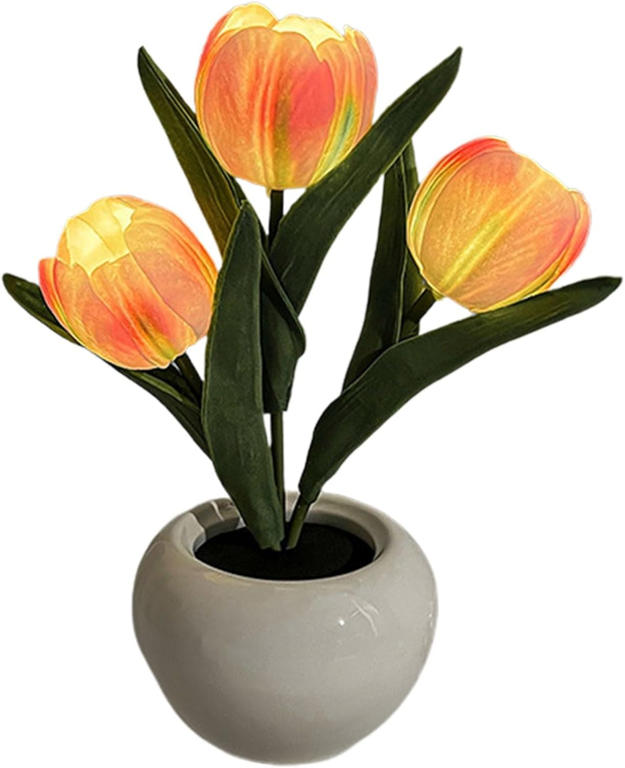 Drei leuchtende orange-gelbe Tulpen mit grünen Blättern stehen in einem runden grauen Keramiktopf.