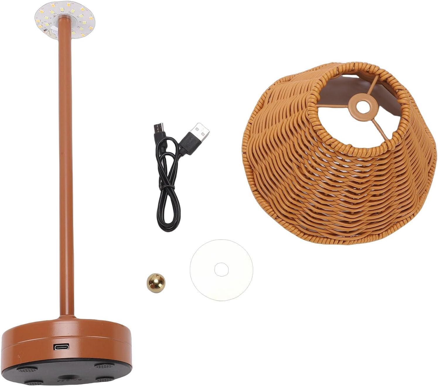 Zerlegte Teile einer braunen Lampe mit Ständer, geflochtenem Schirm, USB-Kabel, goldener Kugel und weißem Aufkleber.
