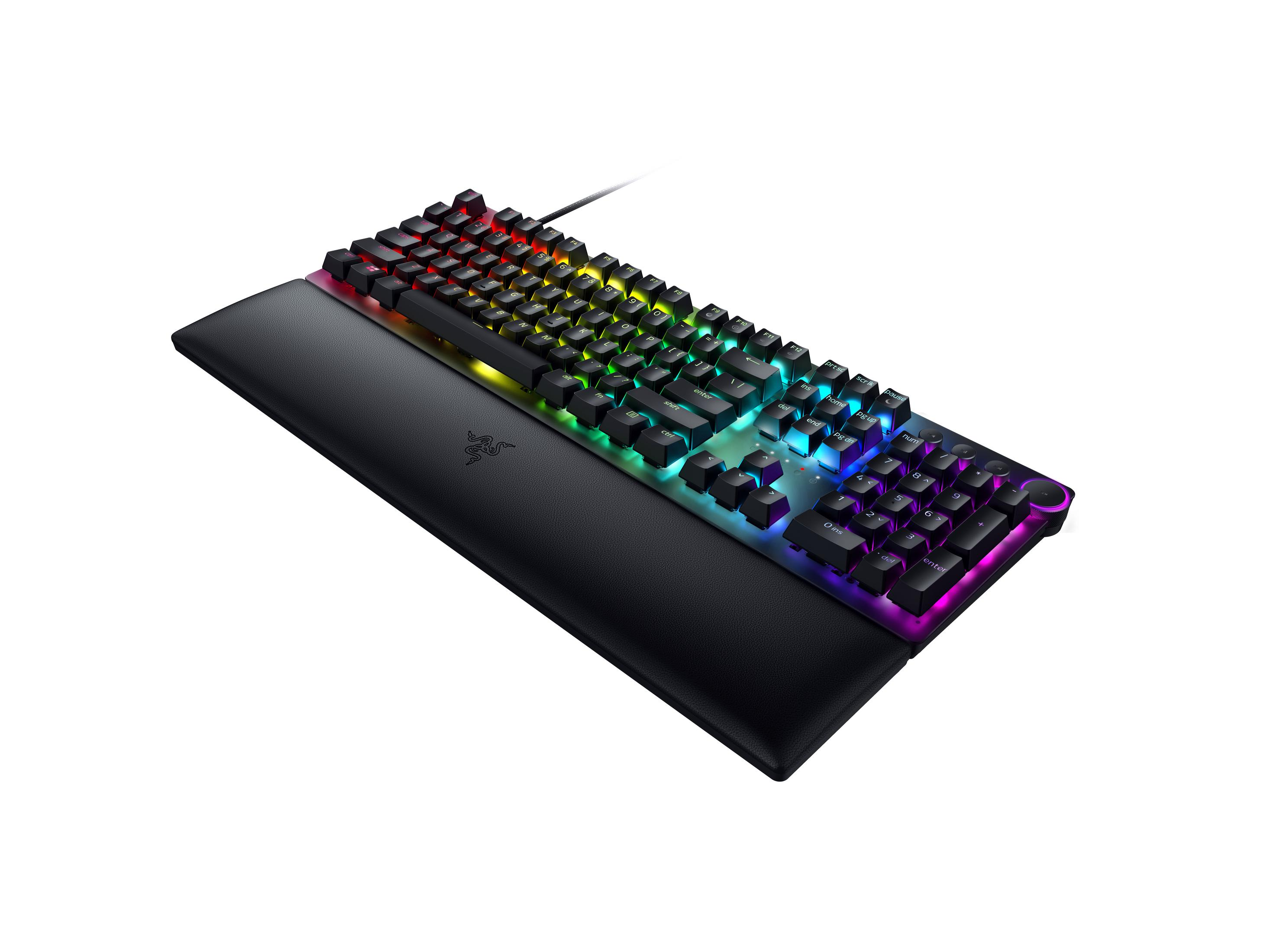 Schwarze Gaming-Tastatur mit RGB-Hintergrundbeleuchtung und einer breiten, gepolsterten Handballenauflage.