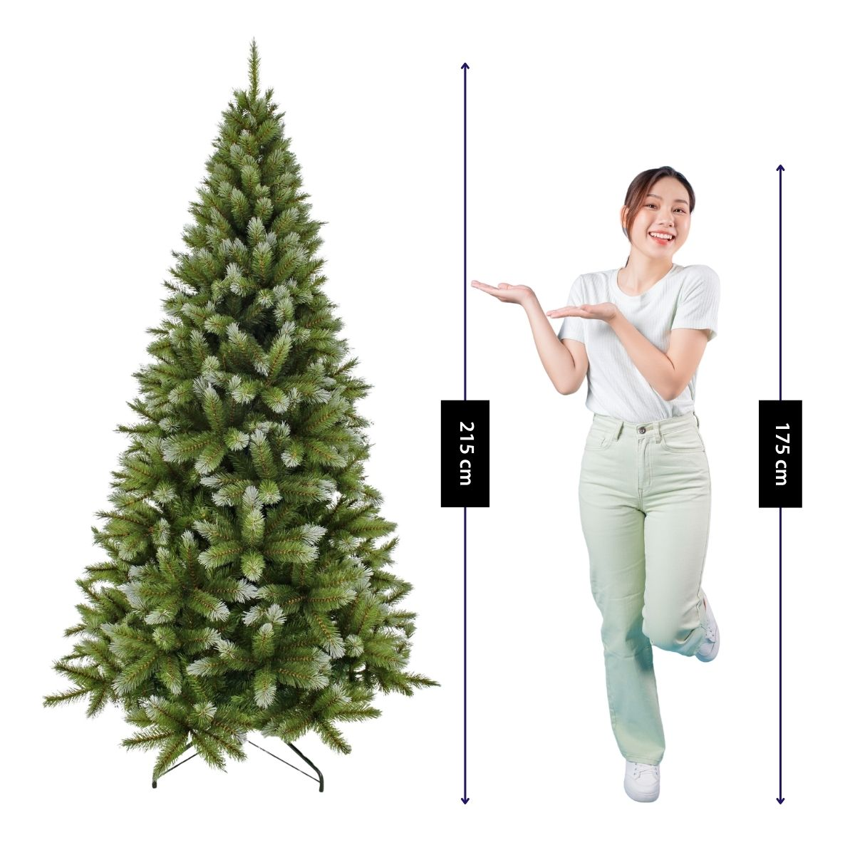 A woman gestures toward an artificial Christmas tree measuring 215 cm.