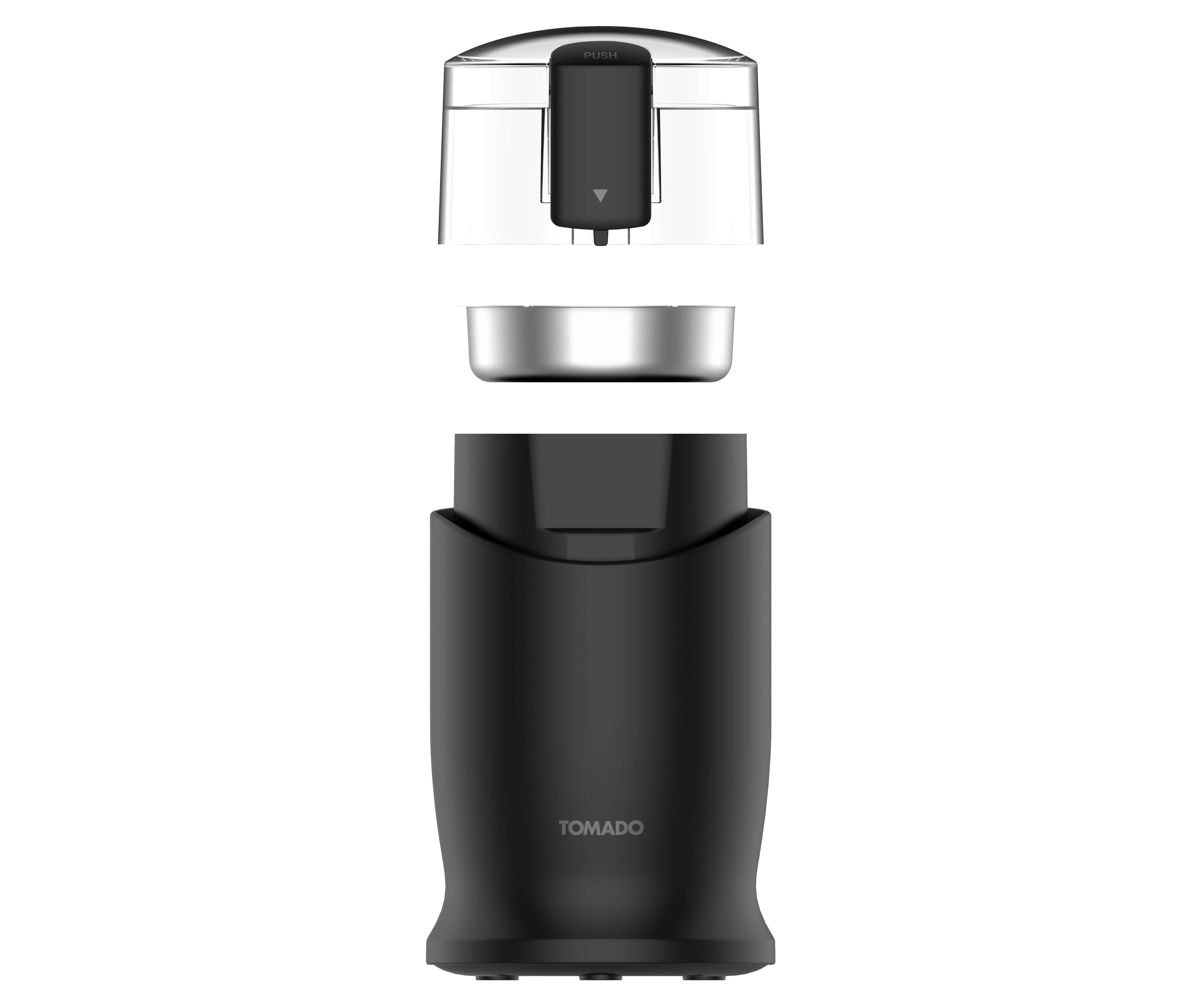 Eine schwarze Tomado-Kaffeemühle, zerlegt in Basis, Mahlbehälter und Deckel auf weißem Hintergrund.