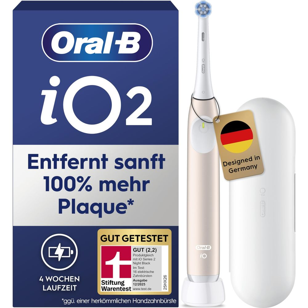 Spazzolino elettrico Oral-B iO2 in oro rosa con confezione, base e custodia.