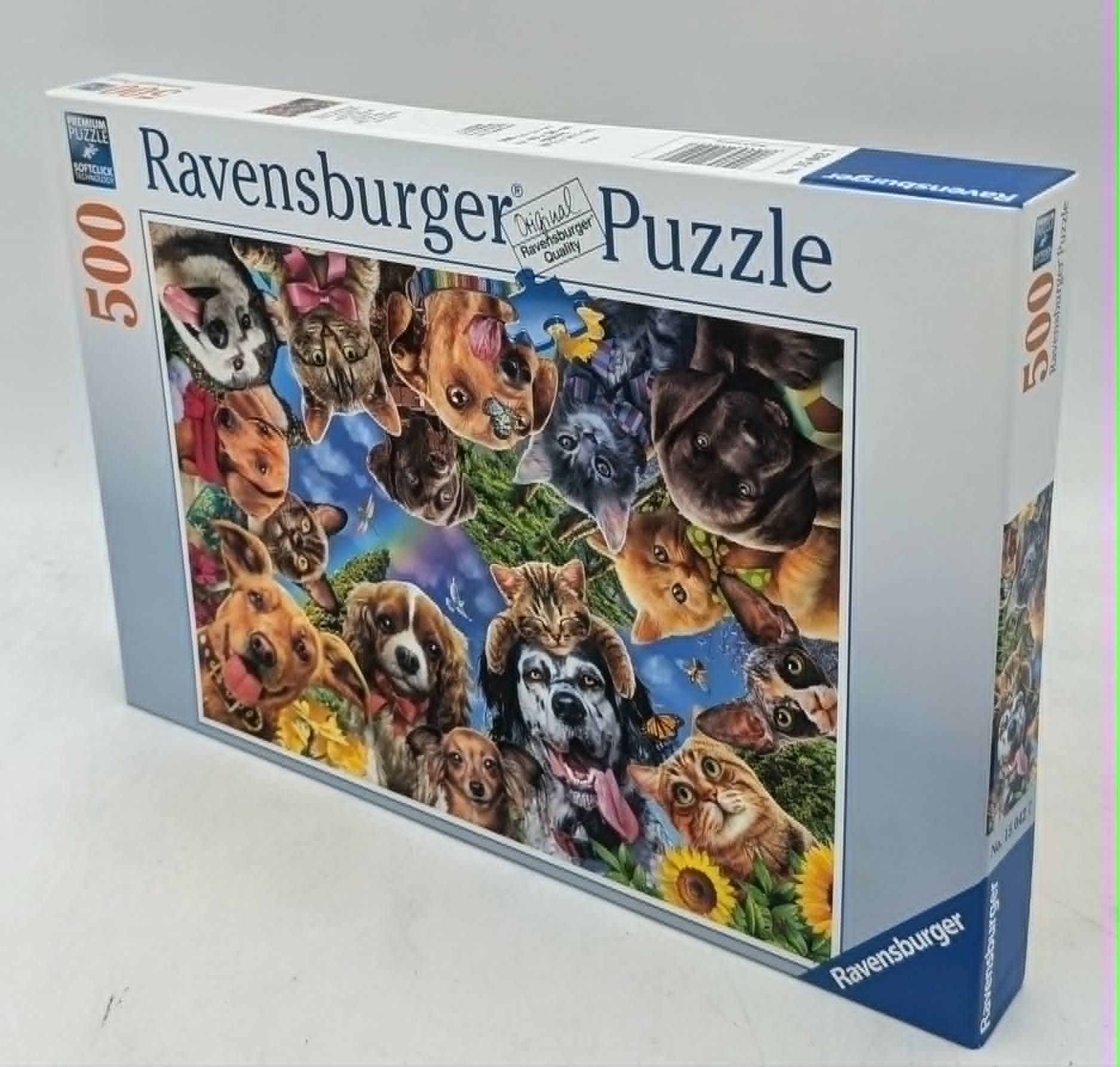 Ravensburger 500-Teile-Puzzlebox mit einer bunten Collage aus niedlichen Katzen und Hunden.