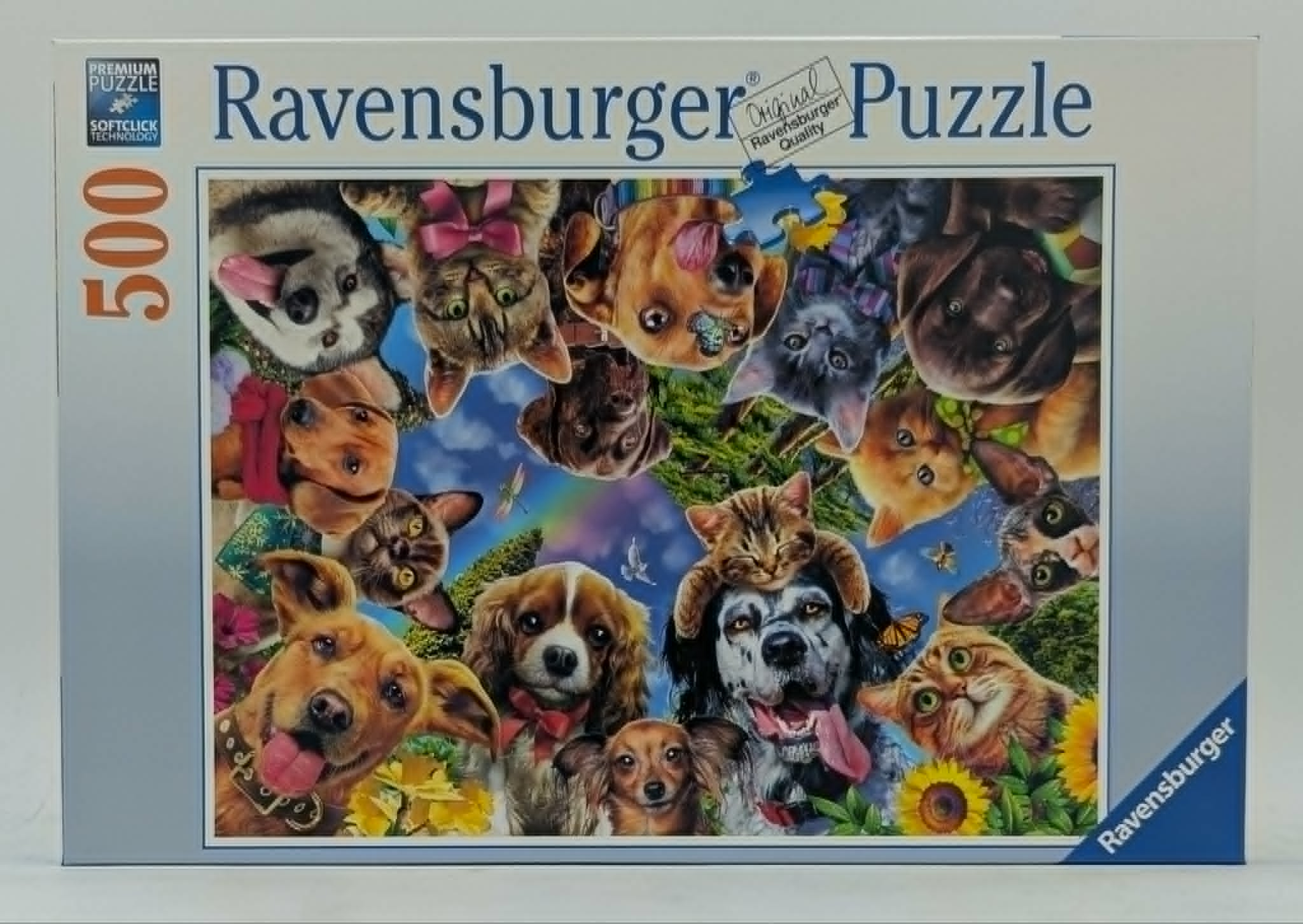 Ravensburger Puzzle mit 500 Teilen und einer collage aus verschiedenen süßen Katzen und Hunden.
