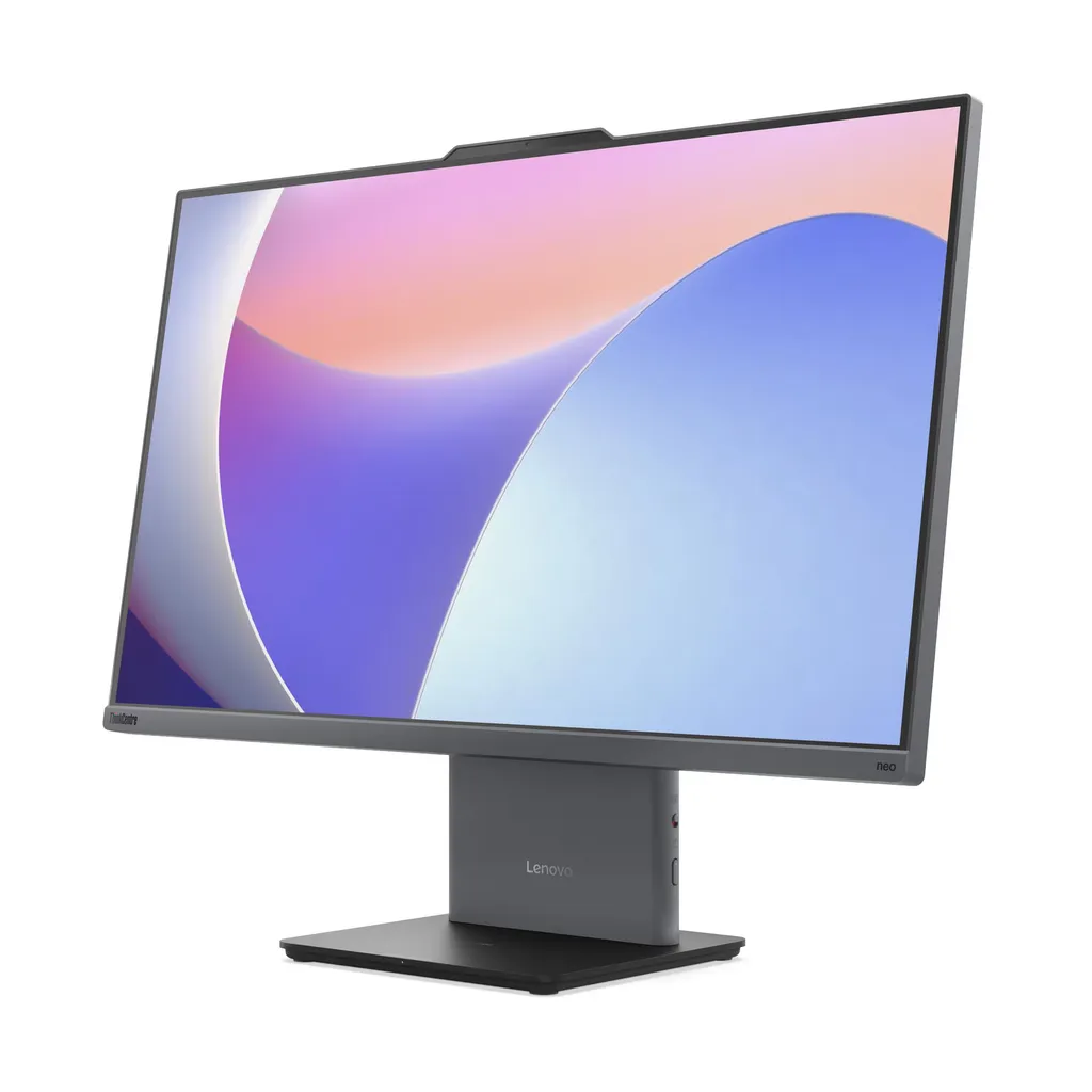 Siyah stant üzerinde gri Lenovo masaüstü monitör, renkli soyut duvar kağıdı gösteriyor.