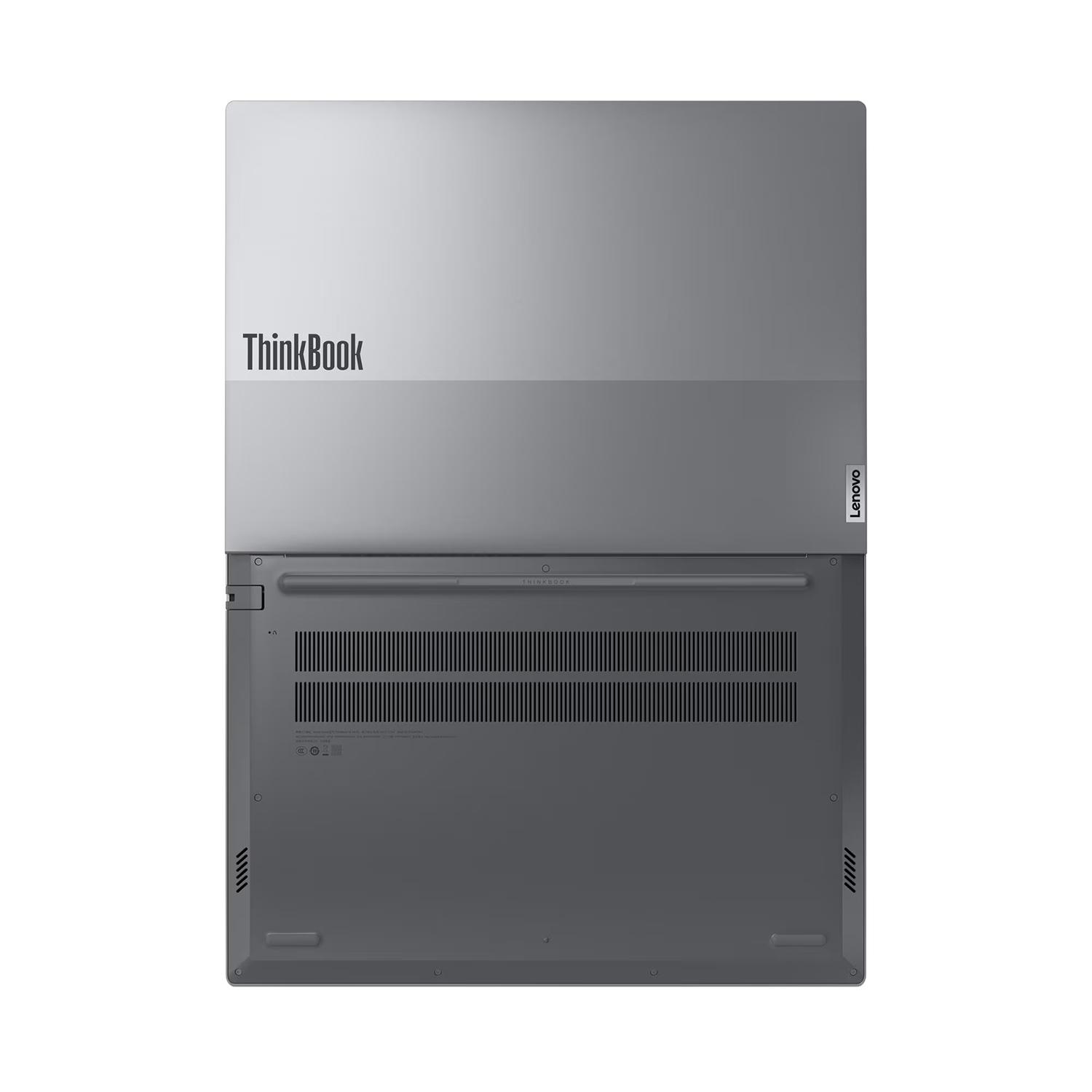 Havalandırma deliklerine sahip gümüş renkli bir Lenovo ThinkBook dizüstü bilgisayarın alt görünümü.