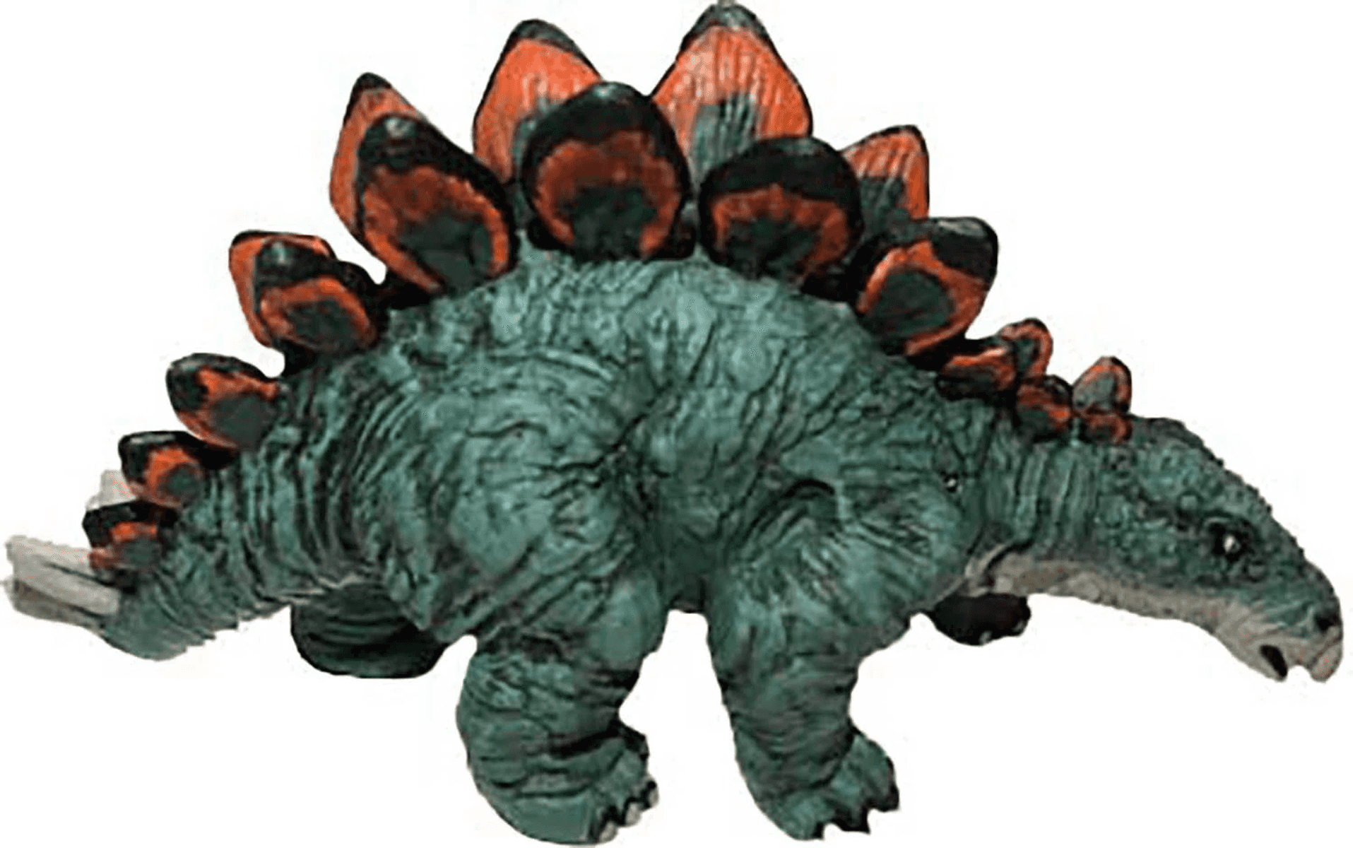 Una figura de juguete de Estegosaurio con piel verde y placas naranjas y negras en la espalda sobre fondo blanco.