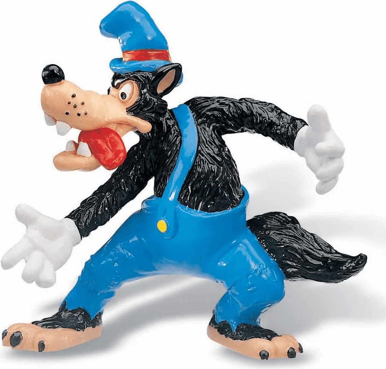 Eine Spielfigur des bösen Wolfs mit blauem Hut und Latzhose, der mit weit aufgerissenem Mund drohend die Arme ausstreckt.