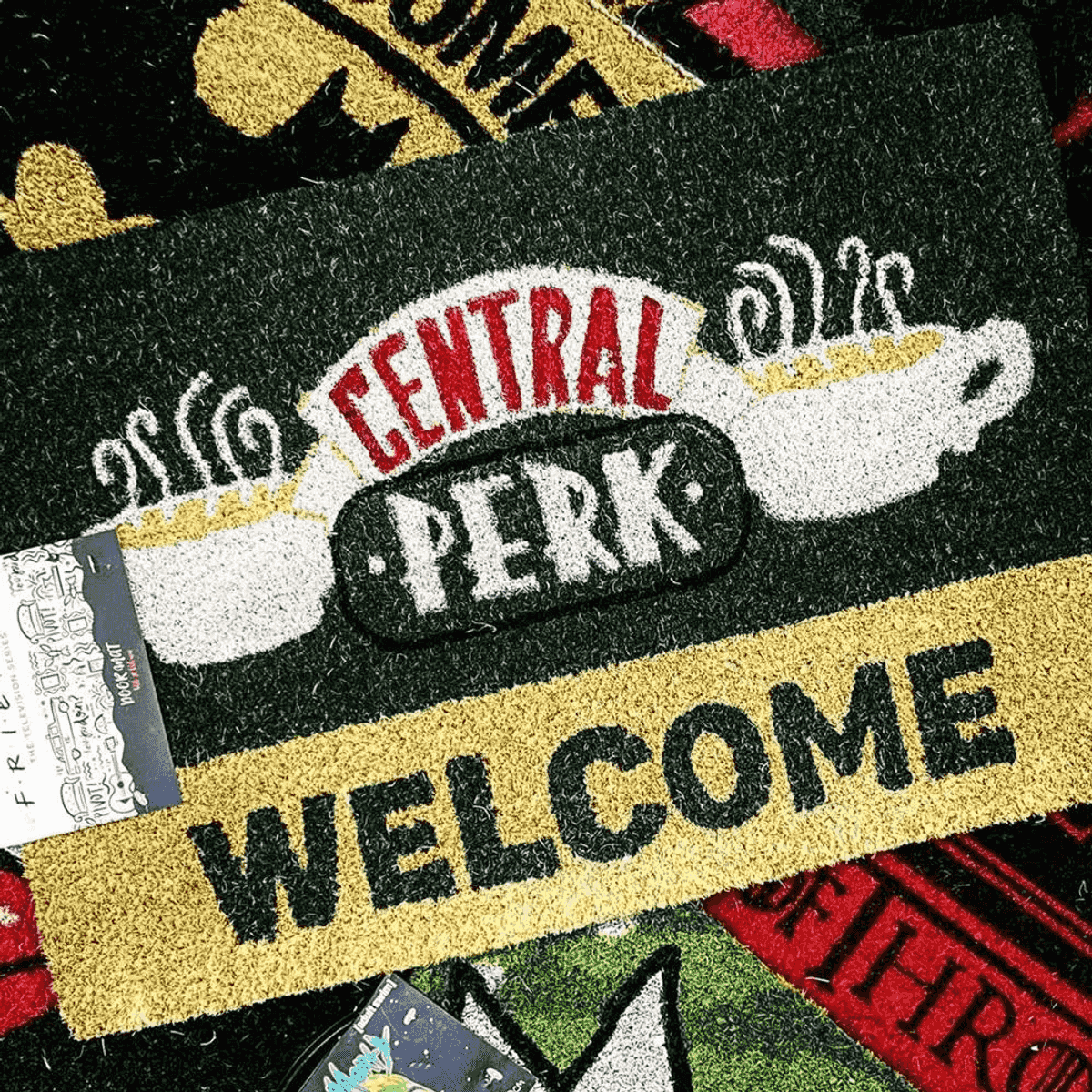 Un felpudo con el logotipo de Central Perk y la palabra WELCOME.