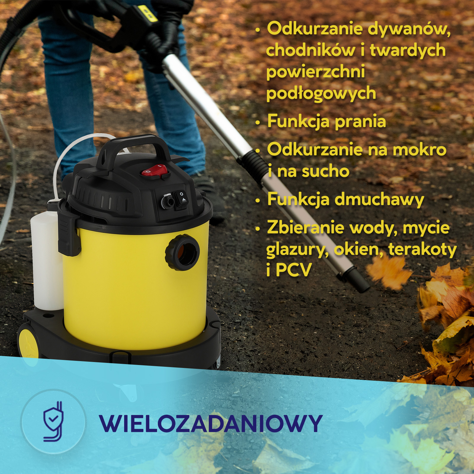 Żółty odkurzacz wielozadaniowy stoi na liściach, a w tle osoba trzyma rurę.