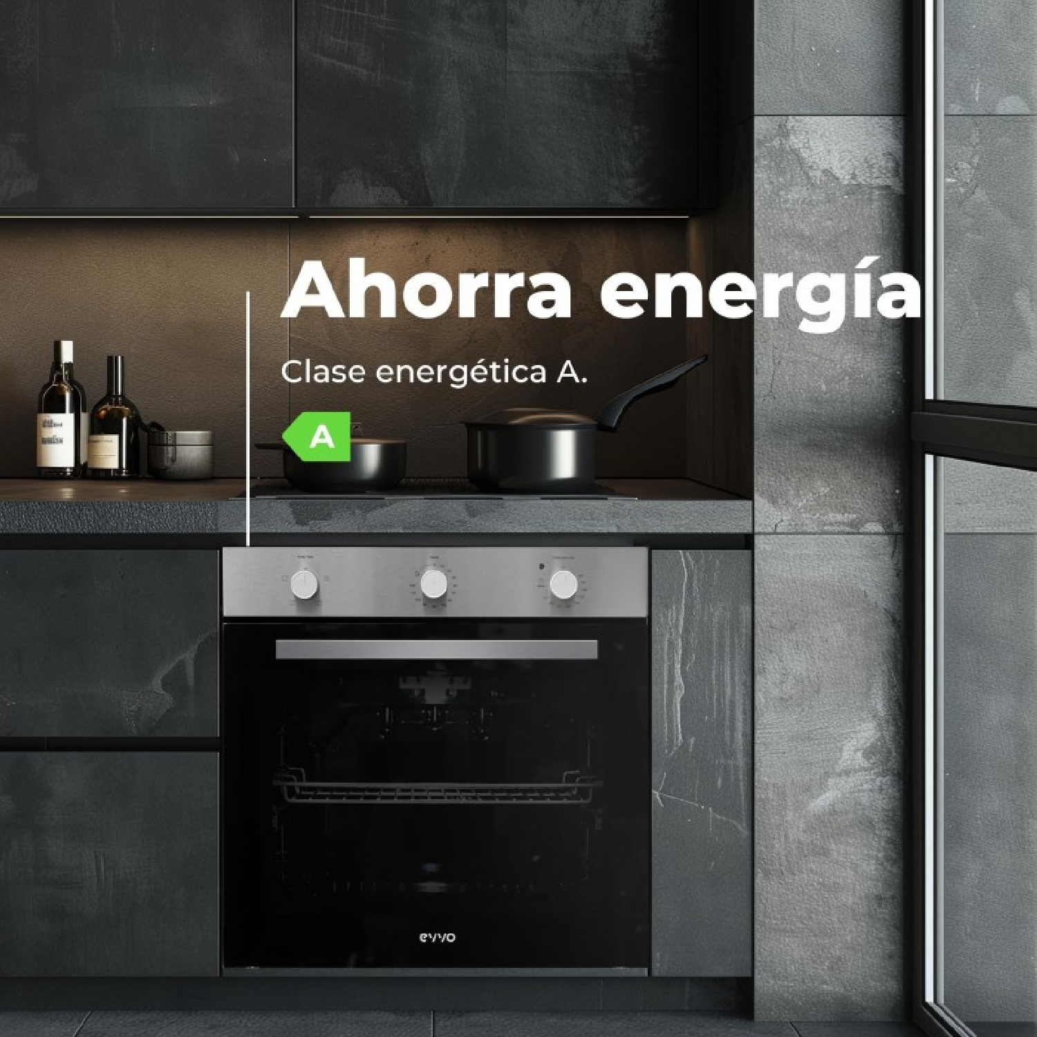 Cocina moderna con horno empotrado, ollas en la encimera y etiqueta de eficiencia energética A.