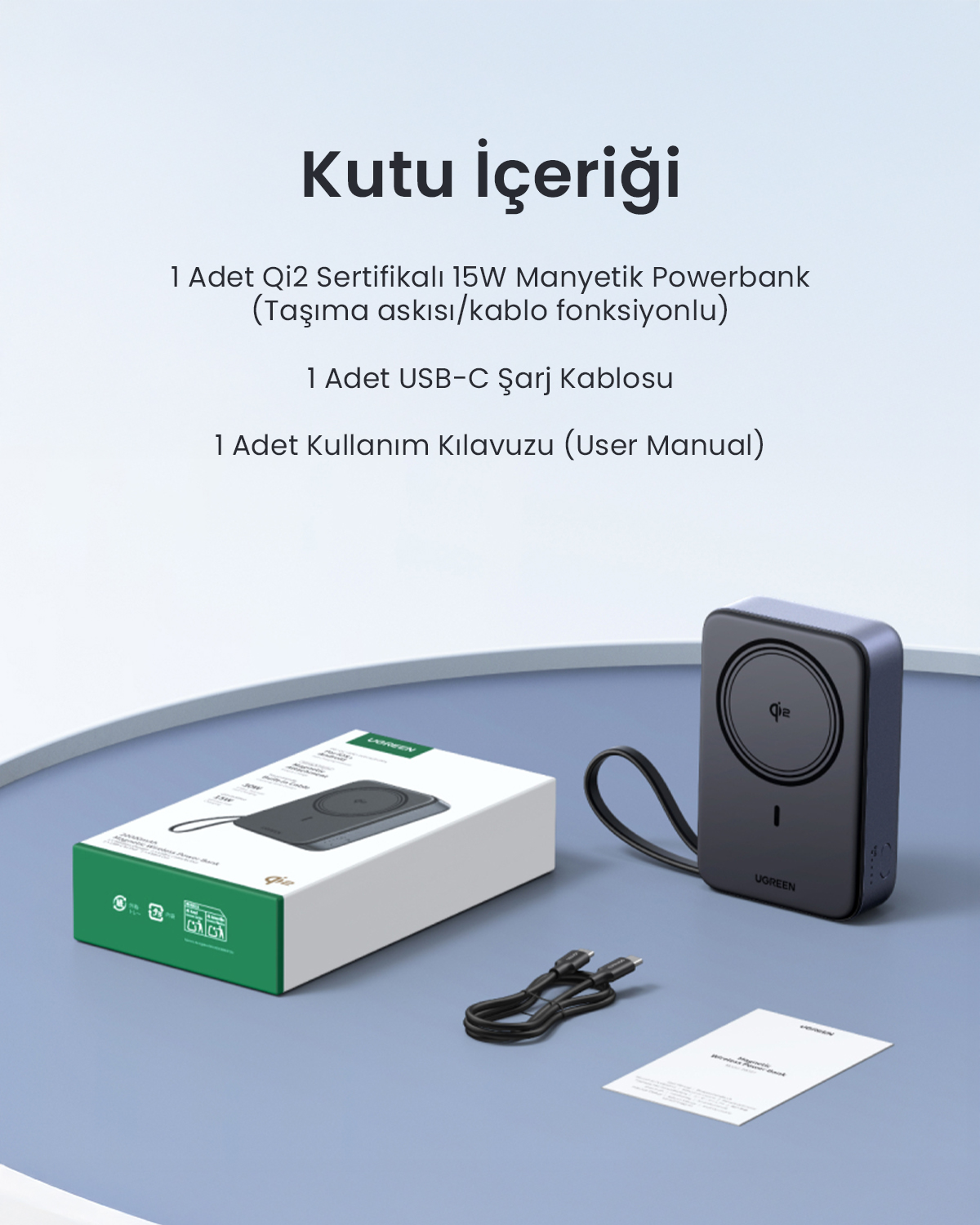 Mavi zemin üzerinde bir powerbank, USB-C kablosu, kılavuz ve kutu.
