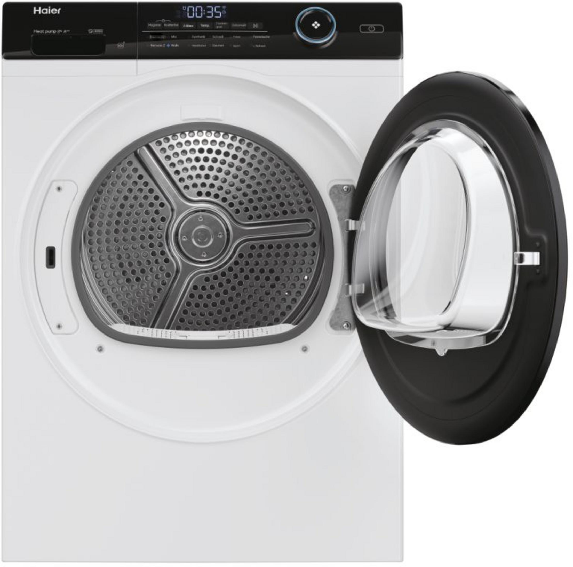 Ein weißer Haier Wäschetrockner mit schwarzem Bedienfeld und geöffneter runder Glastür.