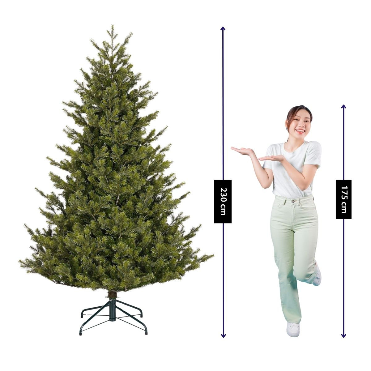 A woman stands next to a 230 cm tall artificial Christmas tree, comparing heights.