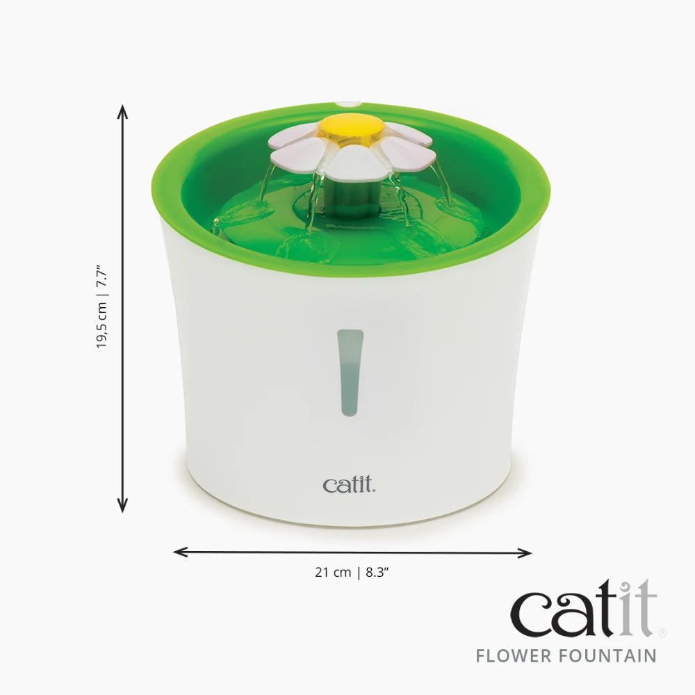 Fuente de agua Catit blanca y verde con flor, con dimensiones de 19.5 cm de alto y 21 cm de ancho.