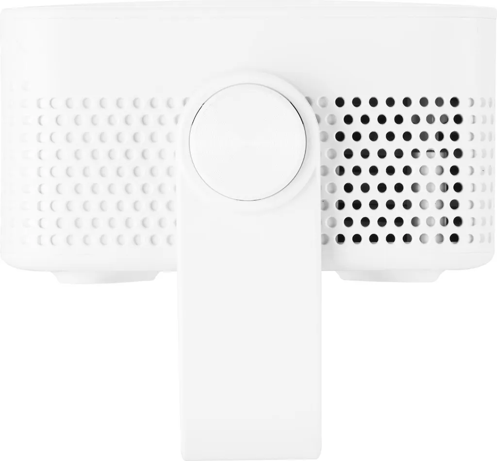 Ein weißes technisches Gerät mit runden Perforationen und einem zentralen runden Bedienelement auf einem Stativ.