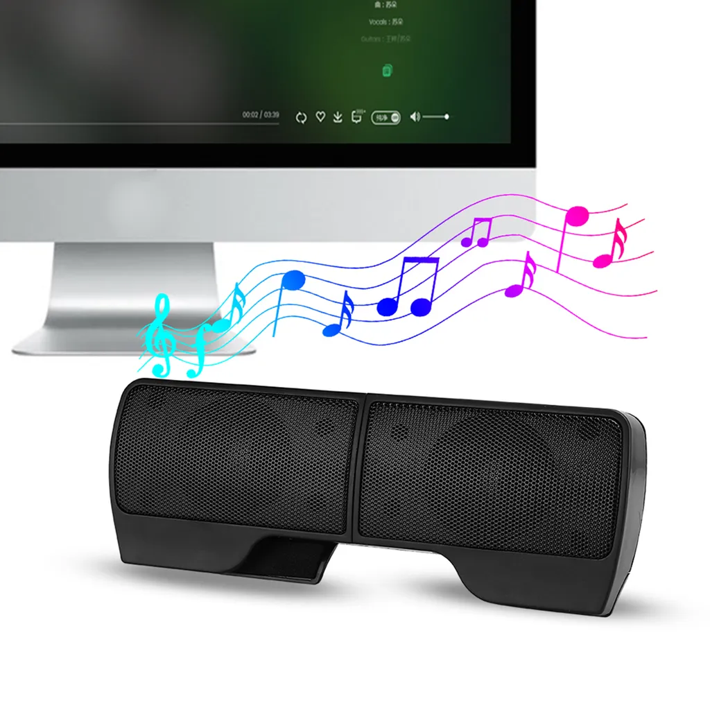 Ein schwarzer Lautsprecher unter einem Monitor emittiert bunte Musiknoten auf weißem Hintergrund.