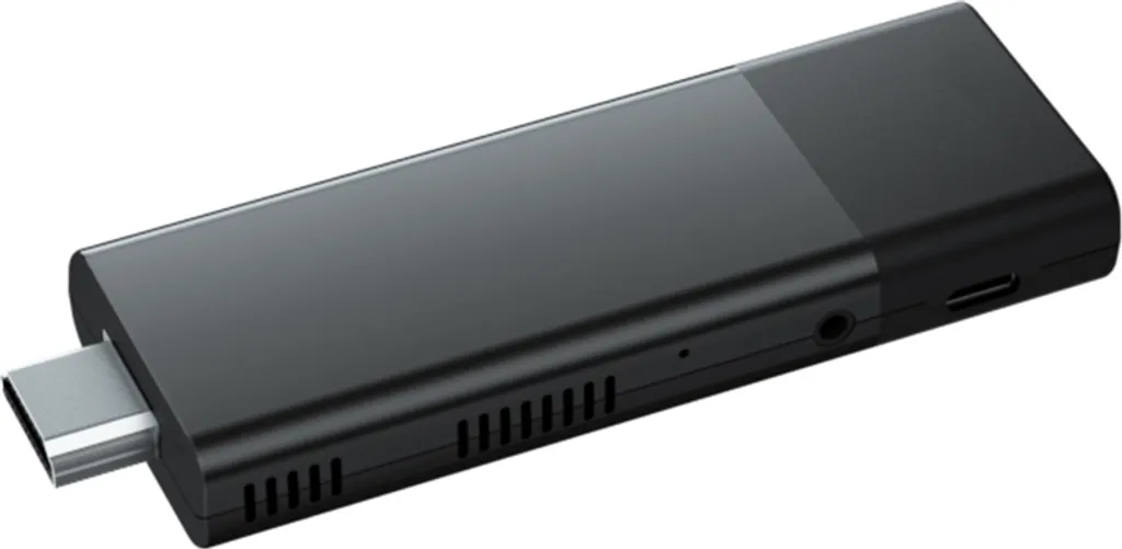 Ein länglicher schwarzer Media-Stick mit einem silbernen HDMI-Anschluss vorne und Lüftungsschlitzen an der Seite.