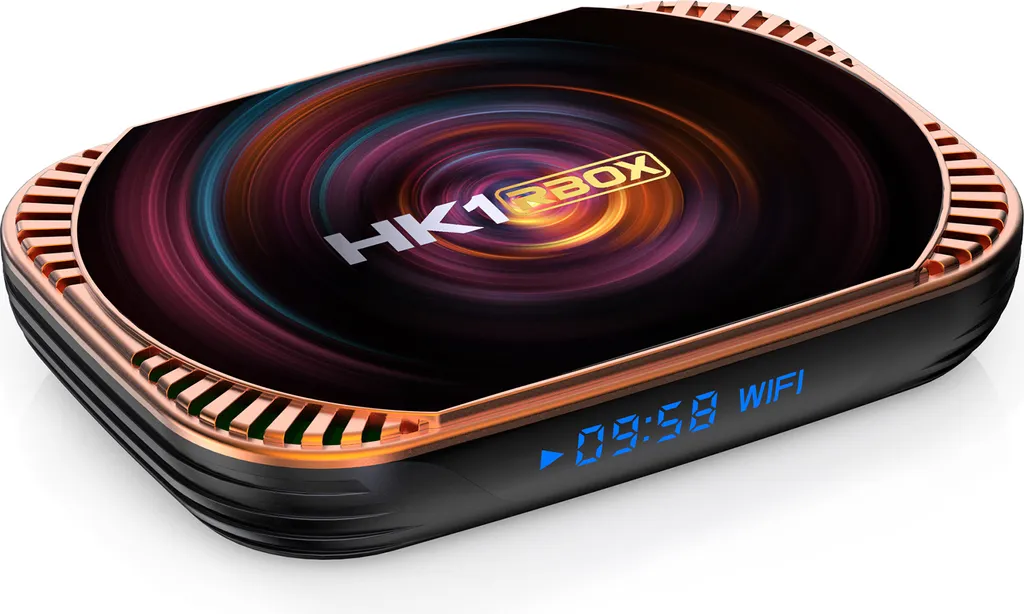 Schwarze TV-Box mit kupferfarbenem Rand und wirbelndem Grafikdesign auf der Oberseite, Vorderseite zeigt blaue LED-Uhr.