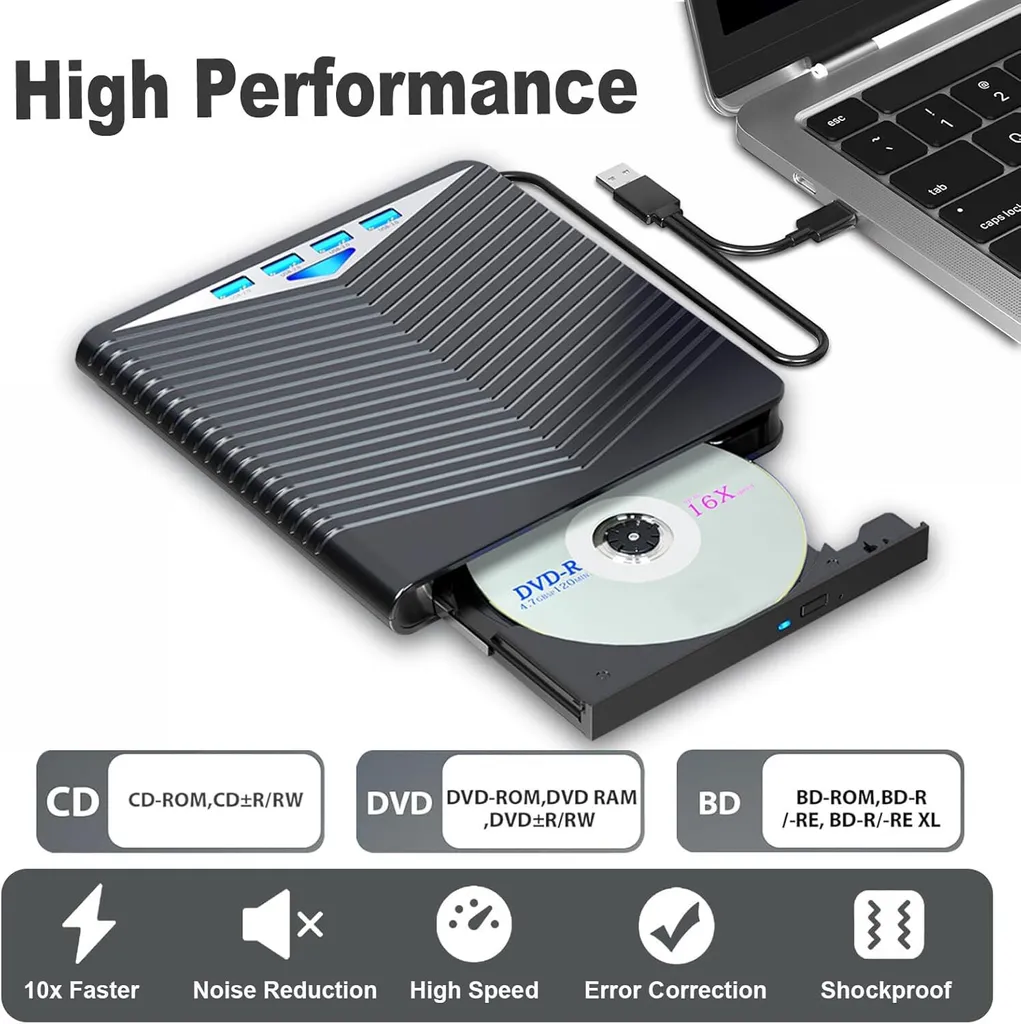Ein tragbares schwarzes optisches Laufwerk mit einer geöffneten DVD-Schublade liegt neben einem Laptop.