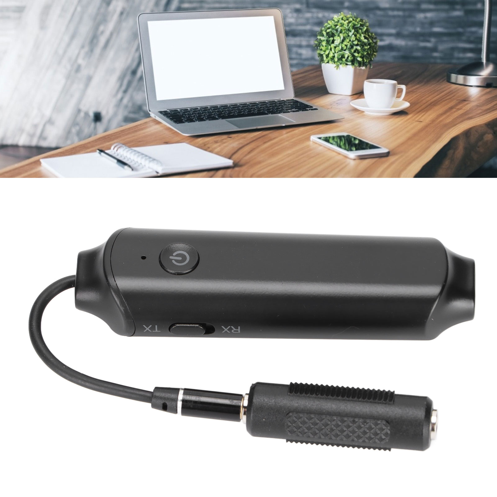Ein schwarzer Audio-Adapter mit Ein-Aus-Schalter, TX-RX-Schalter und einem angeschlossenen Kabel mit Stecker.