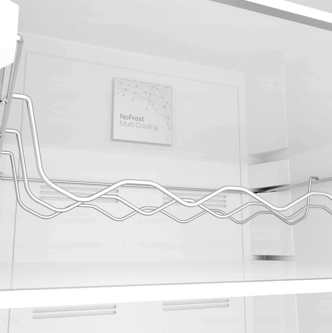 Wnętrze białej lodówki z metalowym stojakiem na butelki i napisem NoFrost Multi Cooling.