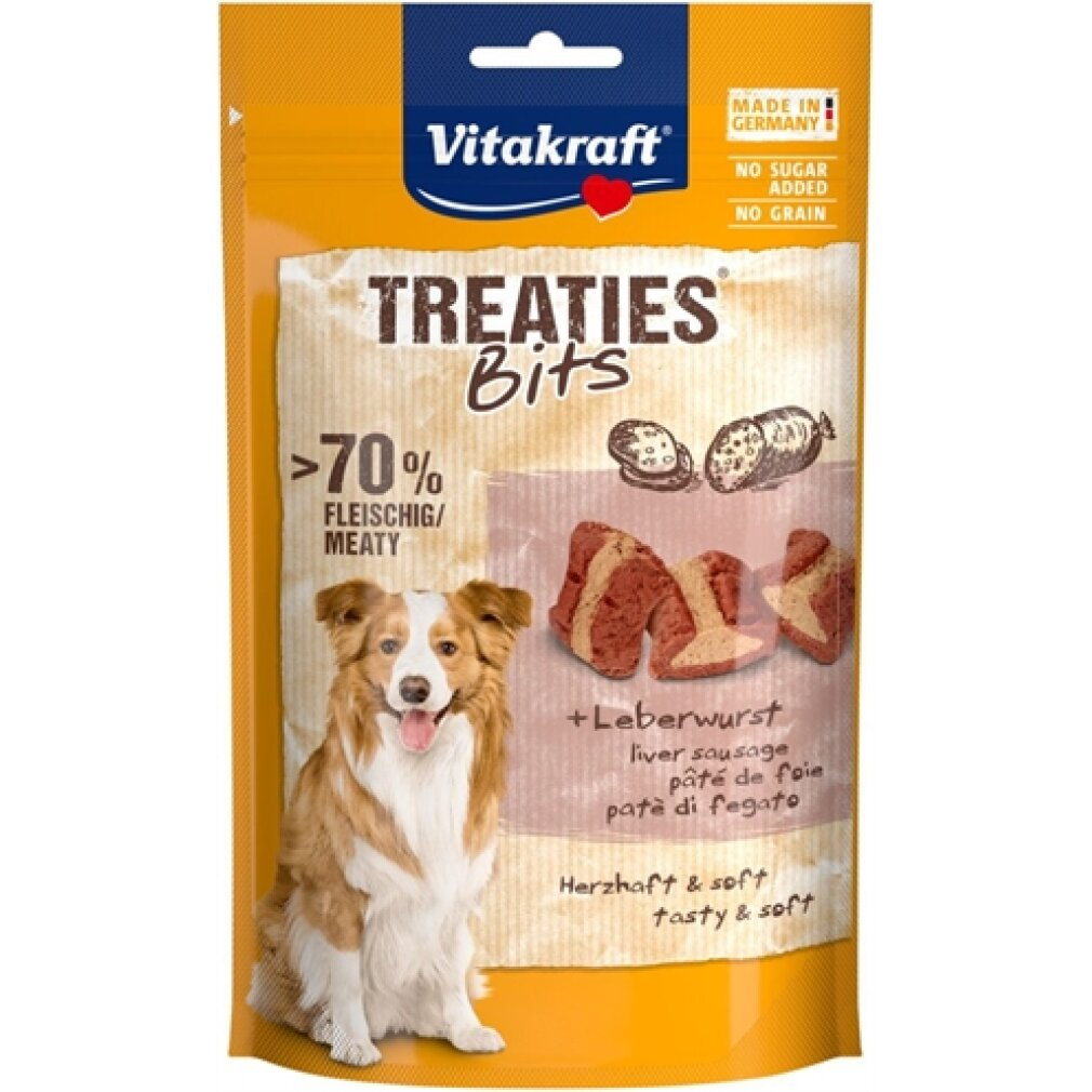 Envase de golosinas para perros Vitakraft Treaties Bits con sabor a salchicha de hígado y un perro.