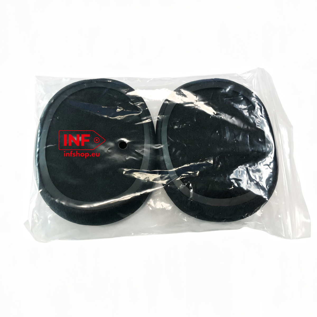 Deux coussinets d'écouteurs noirs dans un sachet plastique scellé.