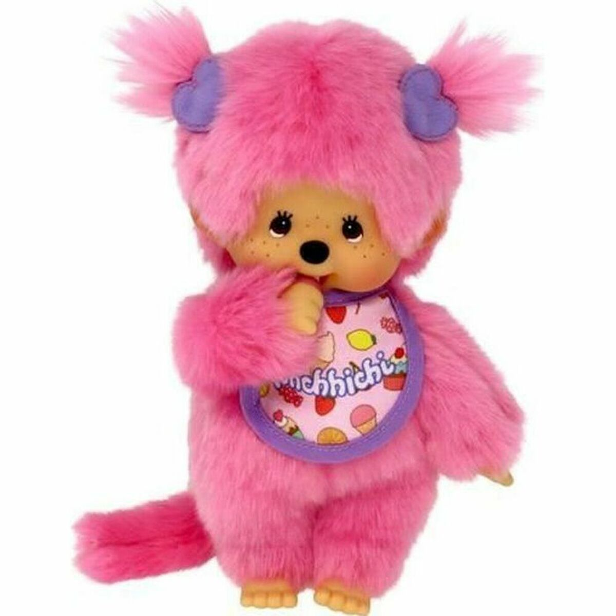 Eine pinke Plüschpuppe mit Zöpfen und Lätzchen, die den Daumen im Mund hat.