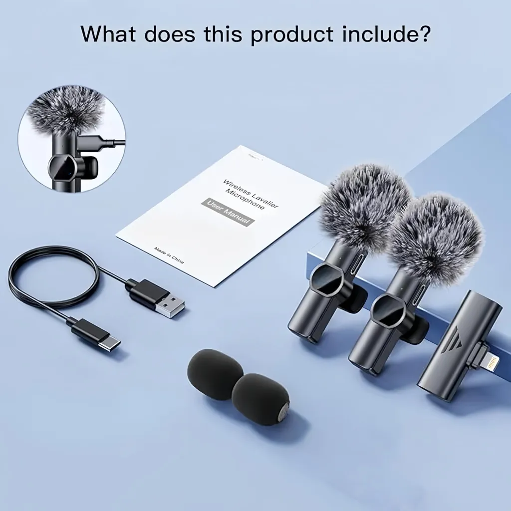 Drahtloses Ansteckmikrofon-Set mit zwei Mikrofonen, Empfänger, Ladekabel, Schaumstoffabdeckungen und Anleitung.