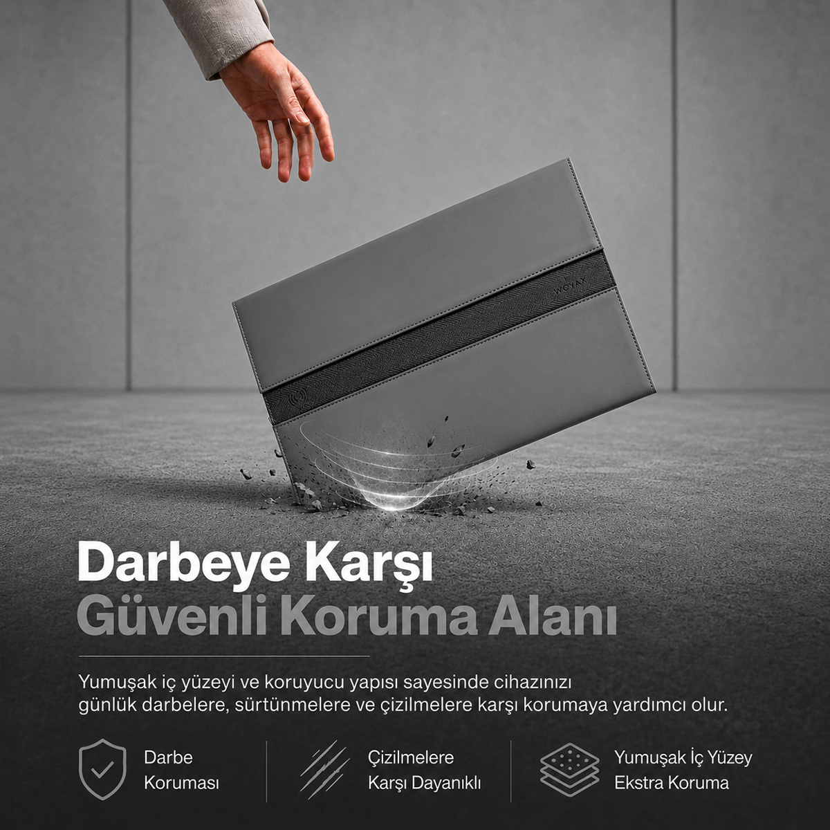 Bir el, gri koruyucu kılıfı betona düşürüyor; darbe dayanımını ve Türkçe metni gösteriyor.