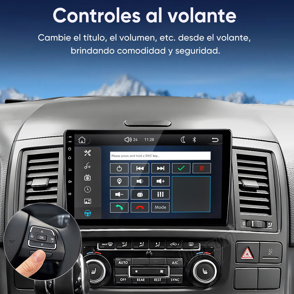 Interior de auto con pantalla táctil y controles en el volante frente a montañas nevadas.