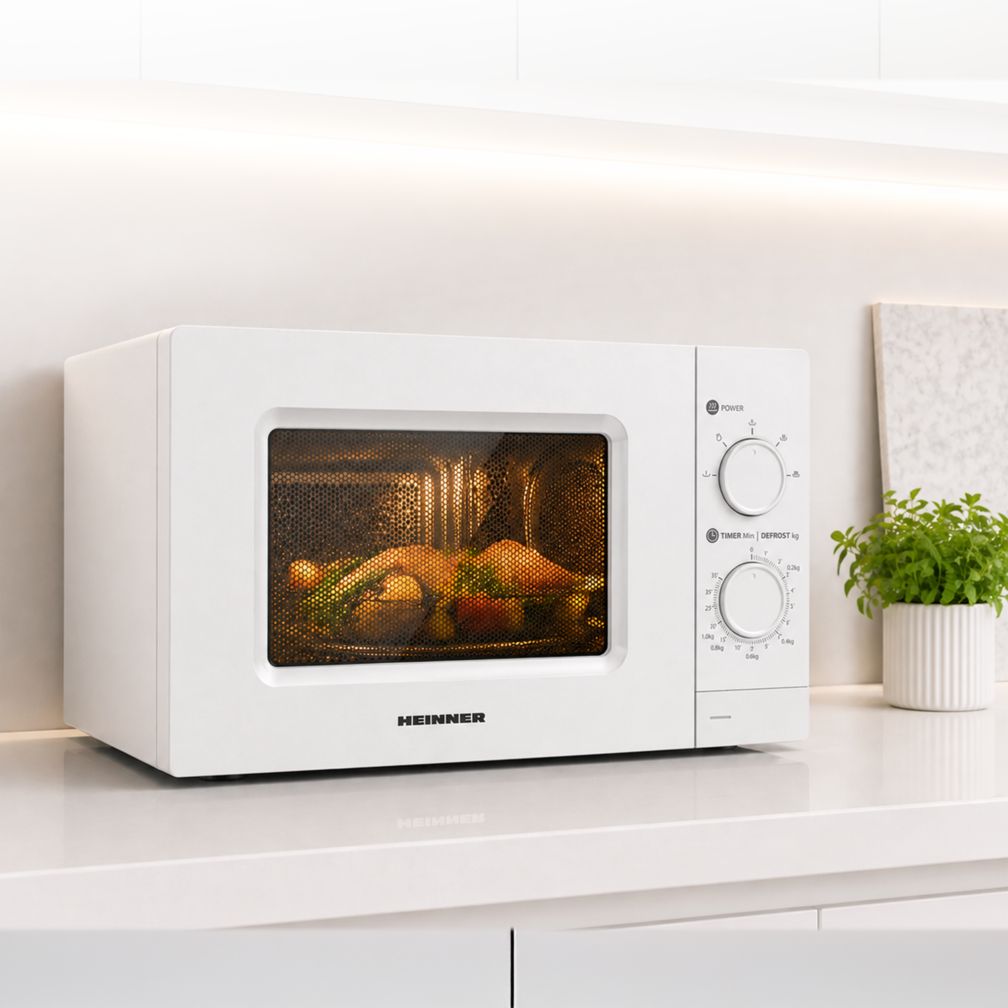 A white microwave sits on a kitchen countertop, with a lit-up roasted chicken cooking inside.