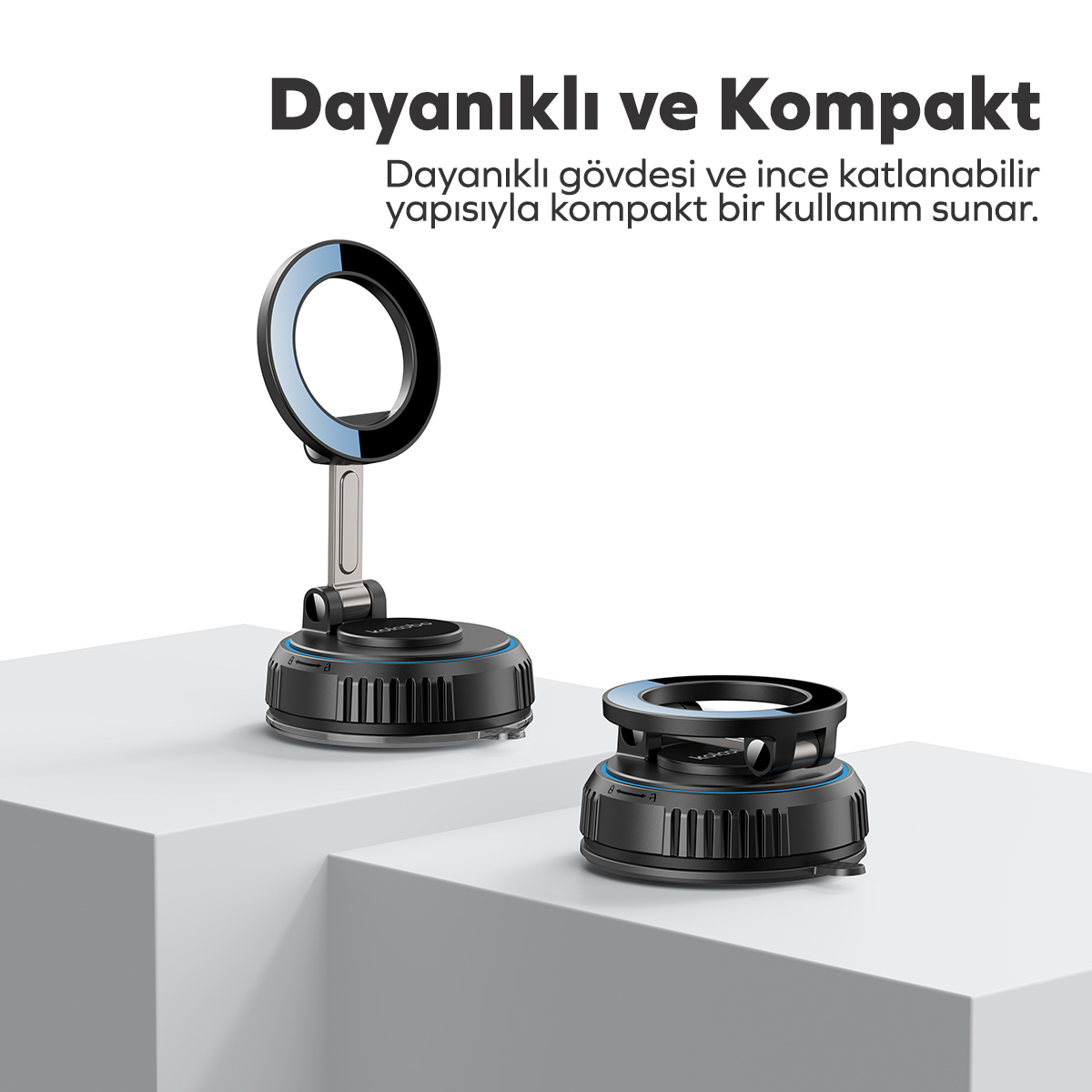 Beyaz kaideler üzerinde uzatılmış ve katlanmış siyah telefon tutucu.