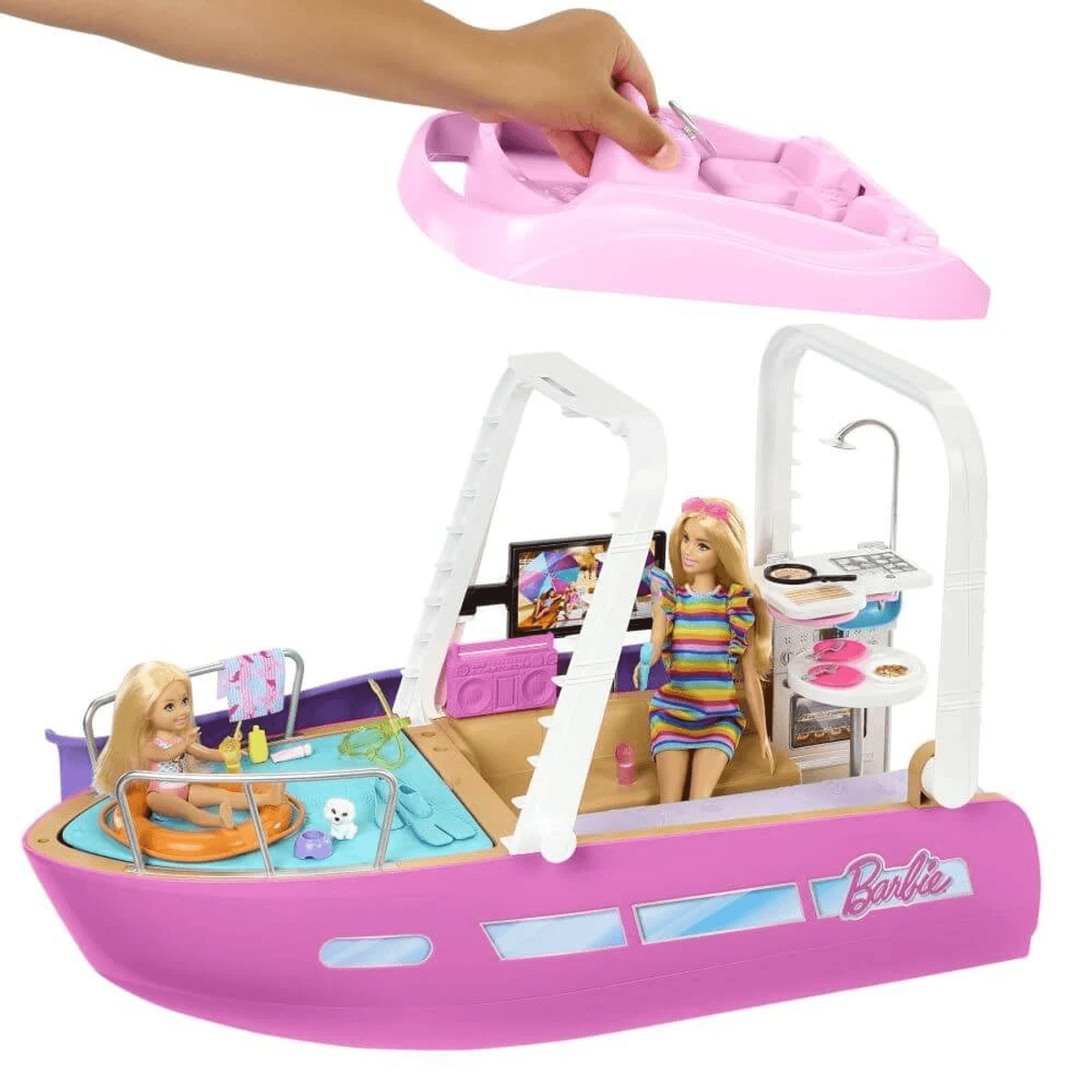 Hand öffnet rosa Barbie-Boot mit Puppen, Haustier und Zubehör.