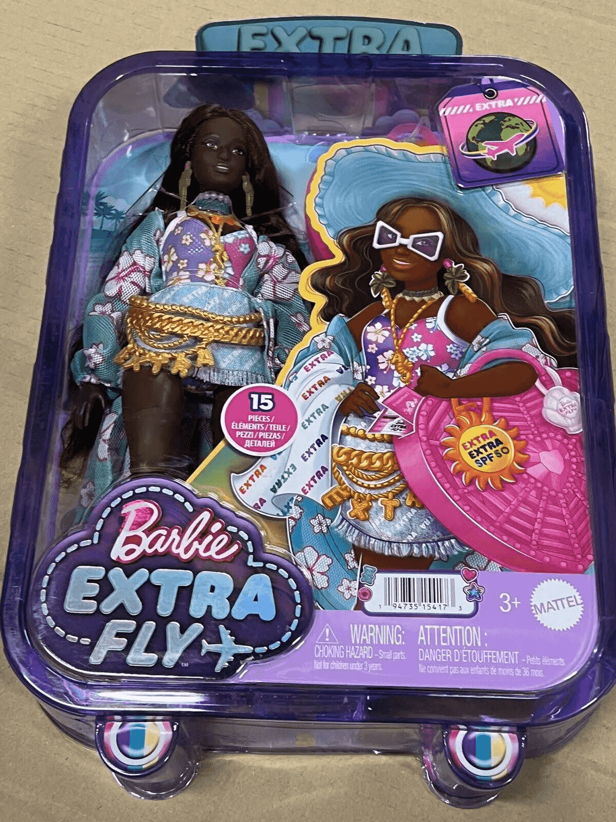 Barbie Extra Fly Puppe in lila Koffer-Verpackung mit Zubehör.
