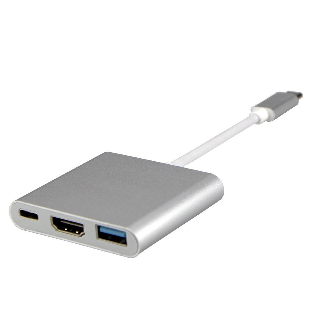 Egy ezüst színű USB-C hub HDMI, USB és USB-C portokkal, sima fehér háttér előtt.