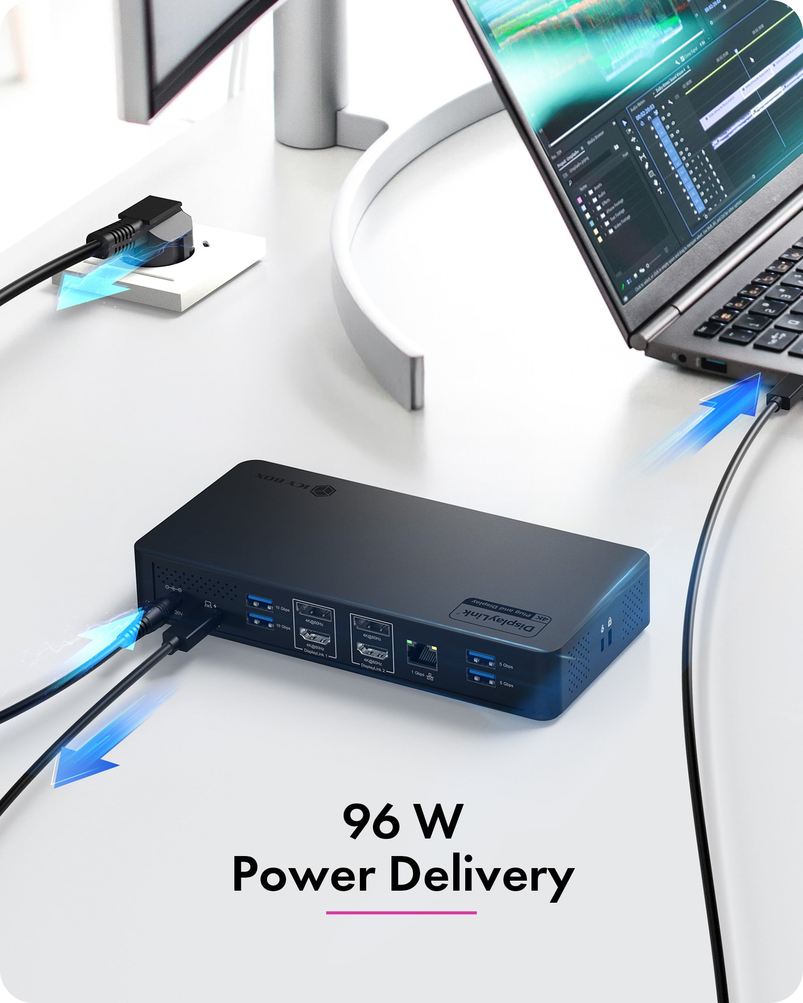 Eine schwarze Dockingstation auf einem Schreibtisch mit Strom und Kabeln und 96W Power Delivery.