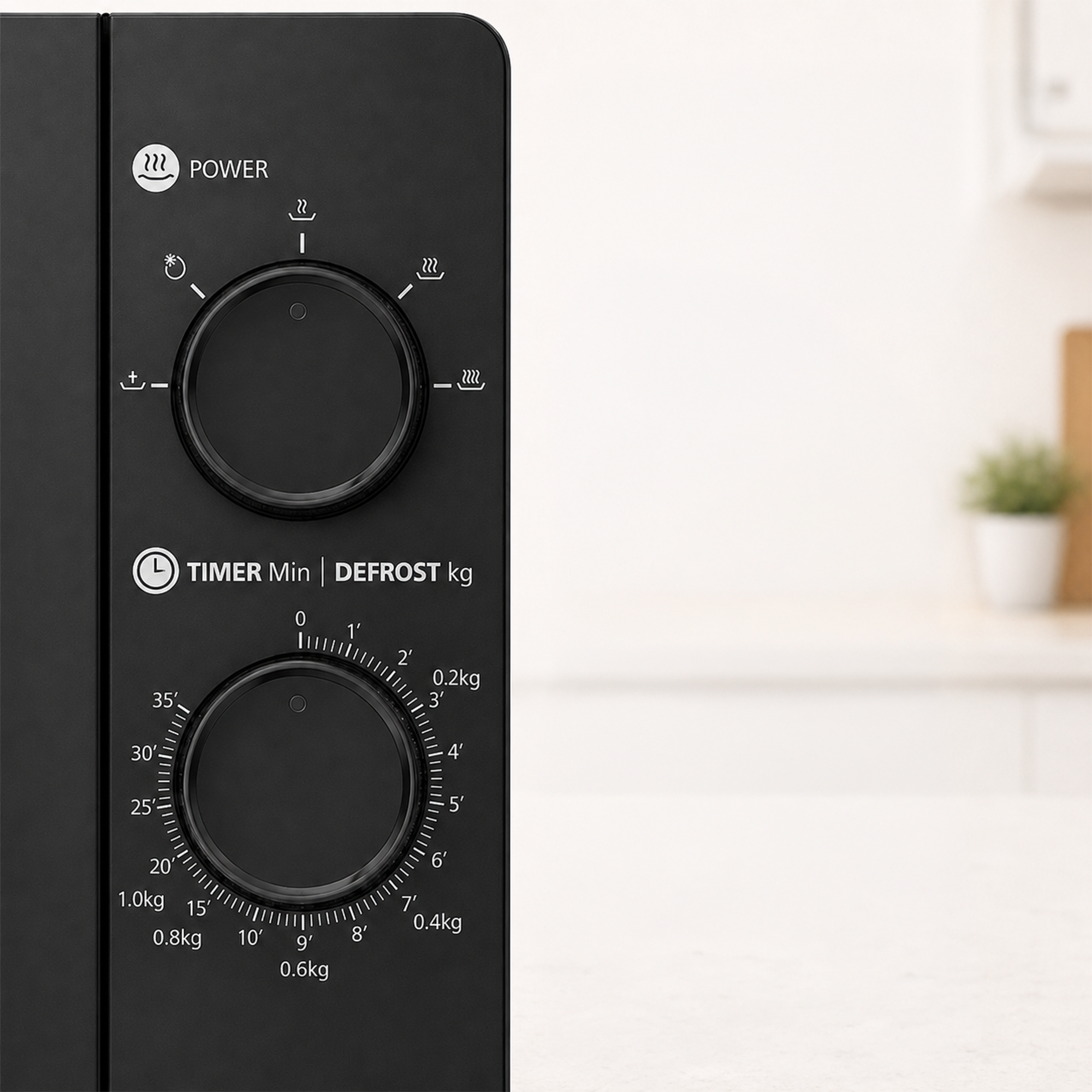 Black microwave control panel with two knobs for power and timer settings.