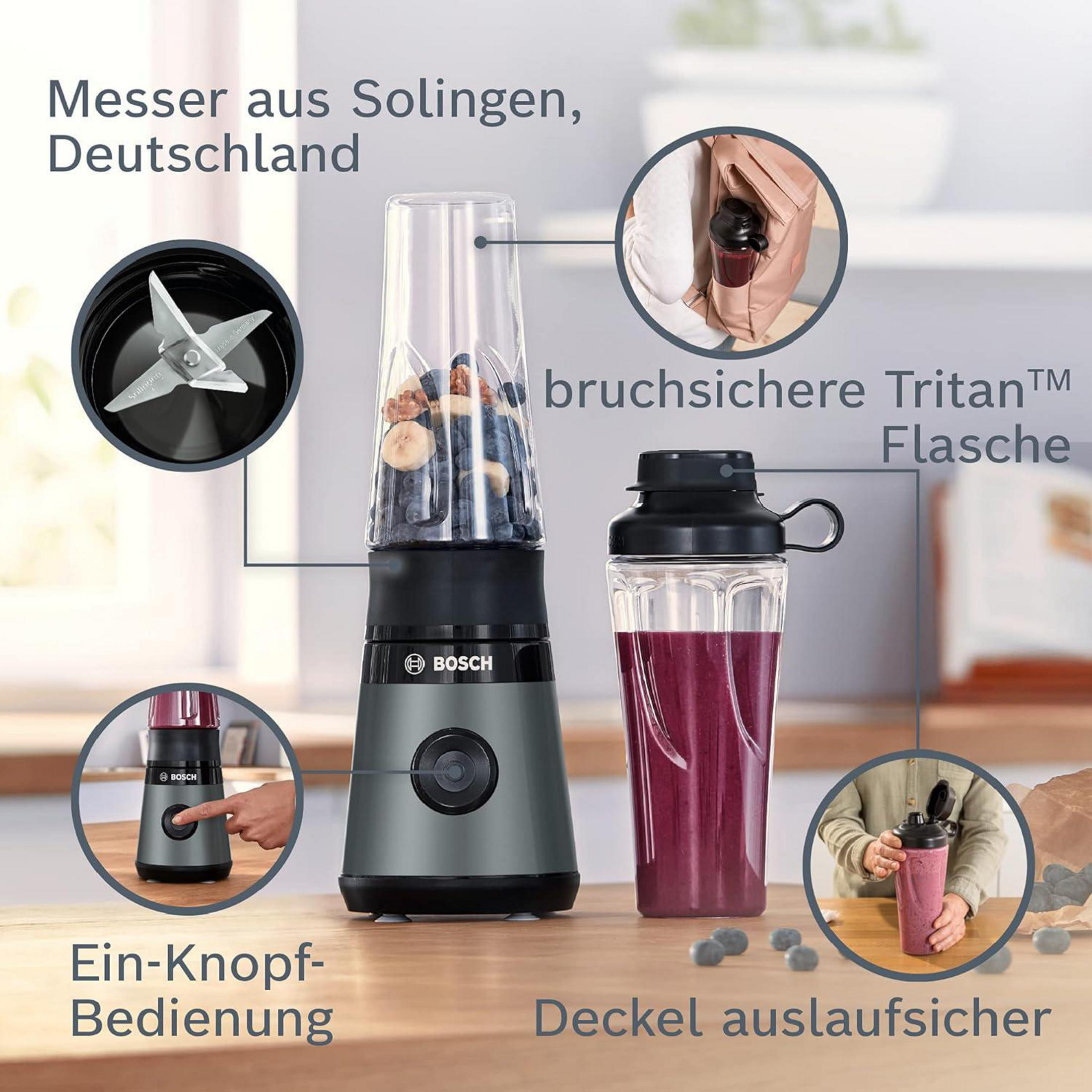 Blender Bosch avec fruits, gourde anti-fuite, lames de Solingen et commande à un bouton sur une table en bois.