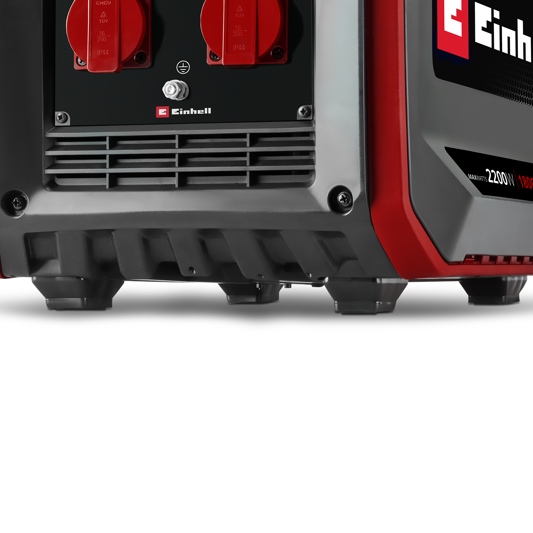 Nahaufnahme eines rot-grauen Einhell-Generators mit Steckdosen, Lüftungsschlitzen und Standfüßen.
