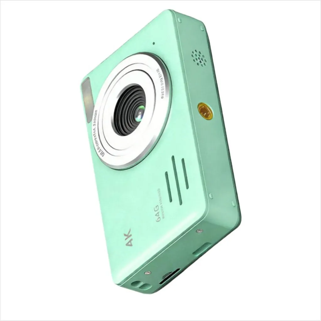 Eine mintgrüne kompakte 4K-Digitalkamera vor weißem Hintergrund.