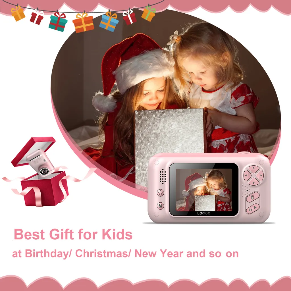 Zwei kleine Mädchen in Weihnachtskleidung öffnen eine Geschenkbox, angezeigt auf einer pinken Kinderkamera.