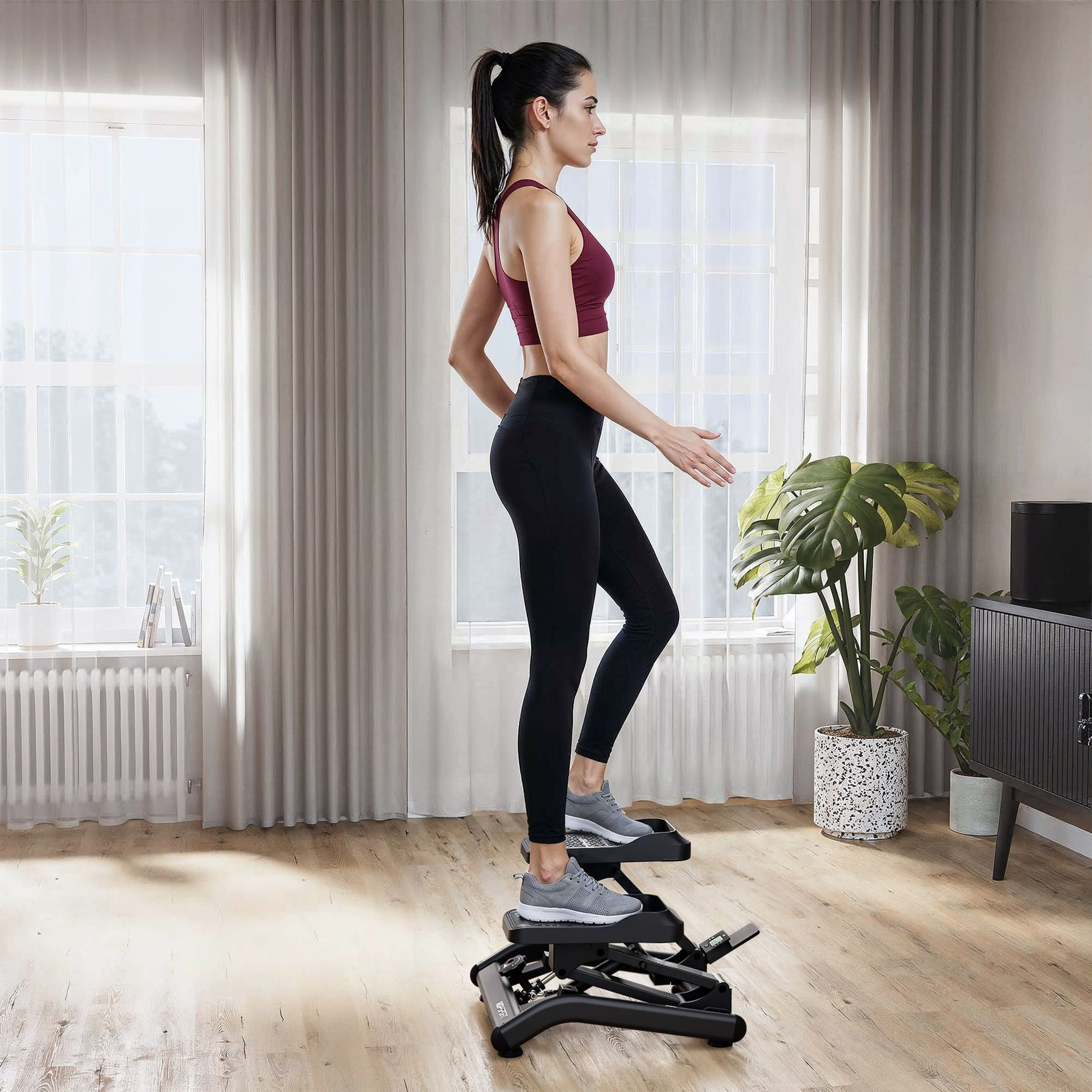 Eine Frau im roten Oberteil und schwarzer Leggings trainiert auf einem Stepper in einem hellen Zimmer.