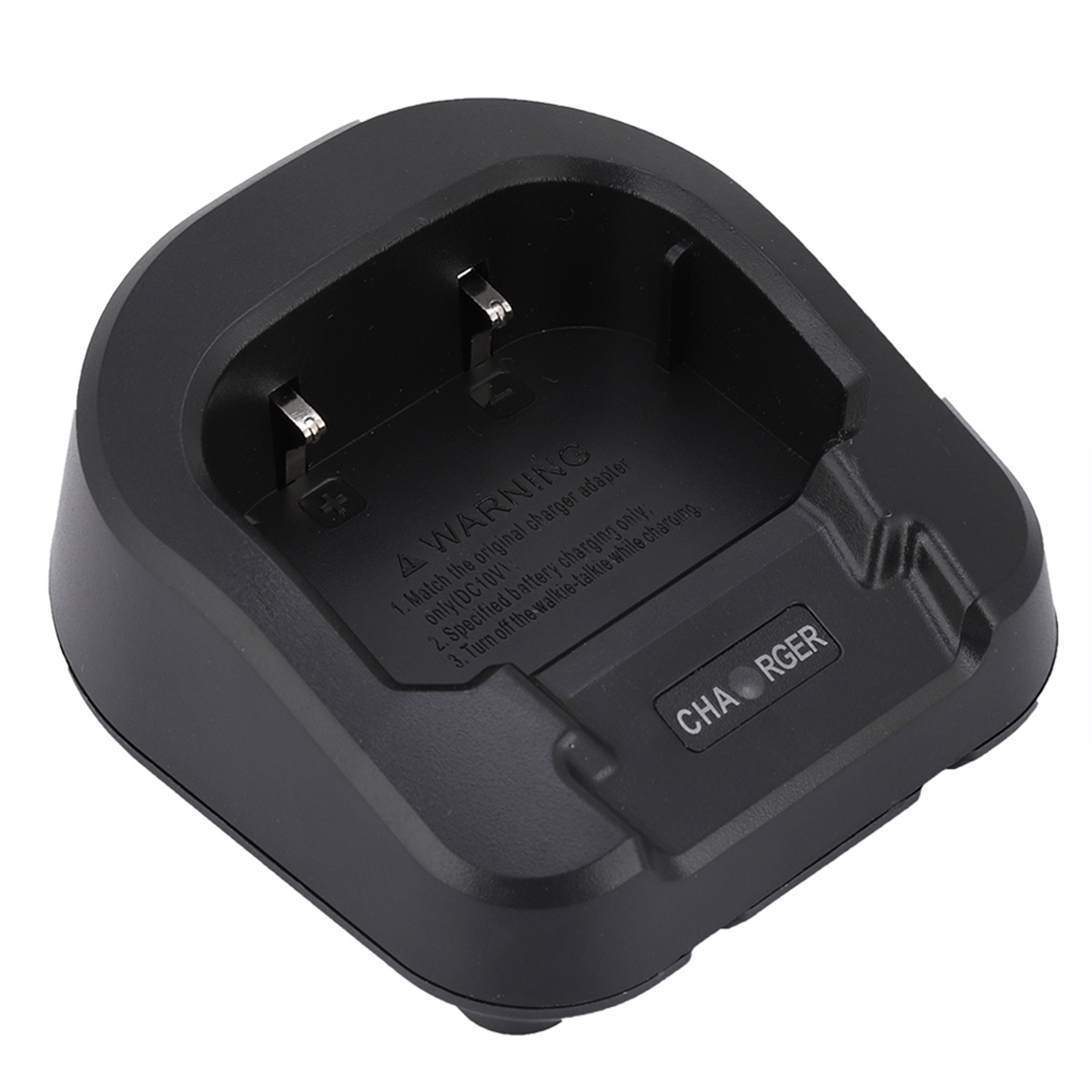 Eine schwarze Walkie-Talkie-Ladestation aus Kunststoff mit Metallkontakten und Warntext.
