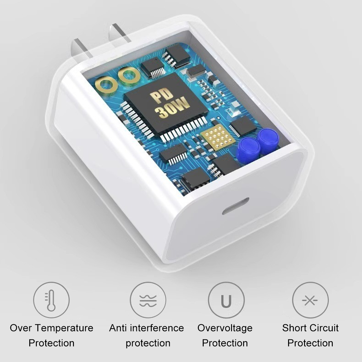 Aufgeschnittener weißer 30W PD USB-C-Ladegerät zeigt seine inneren Schaltkreise und Sicherheitsmerkmale.