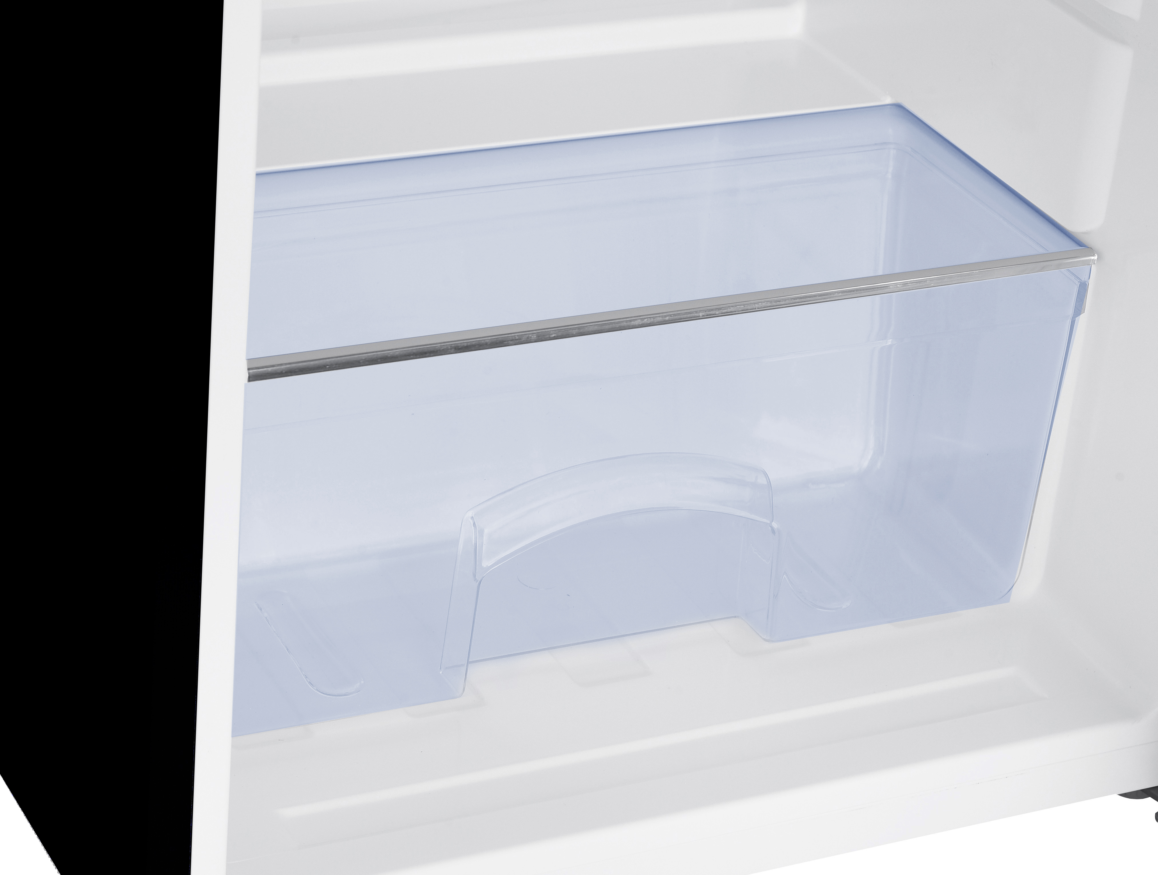 A clear, blue-tinted vegetable crisper drawer inside the lower section of a white refrigerator.