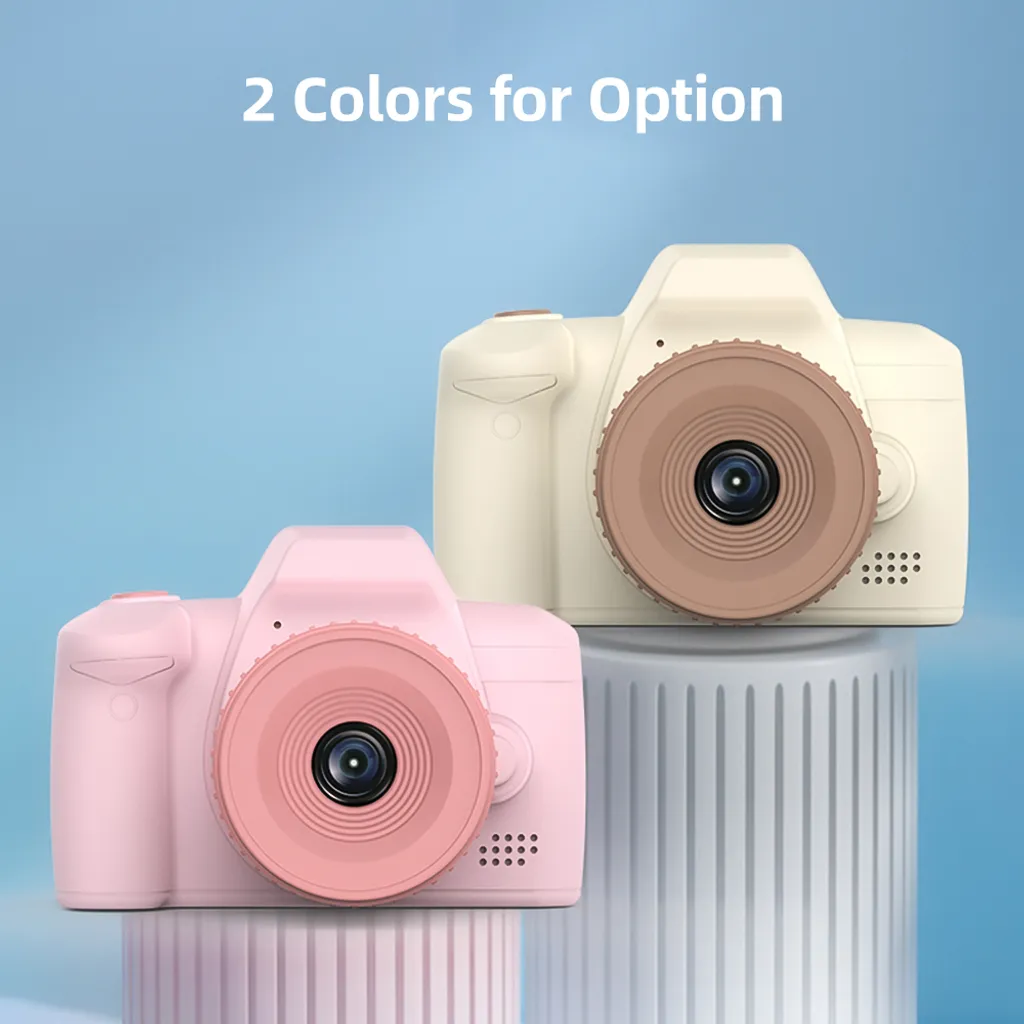 Zwei Kinderkameras in Beige und Rosa auf zylindrischen Sockeln vor blauem Hintergrund.